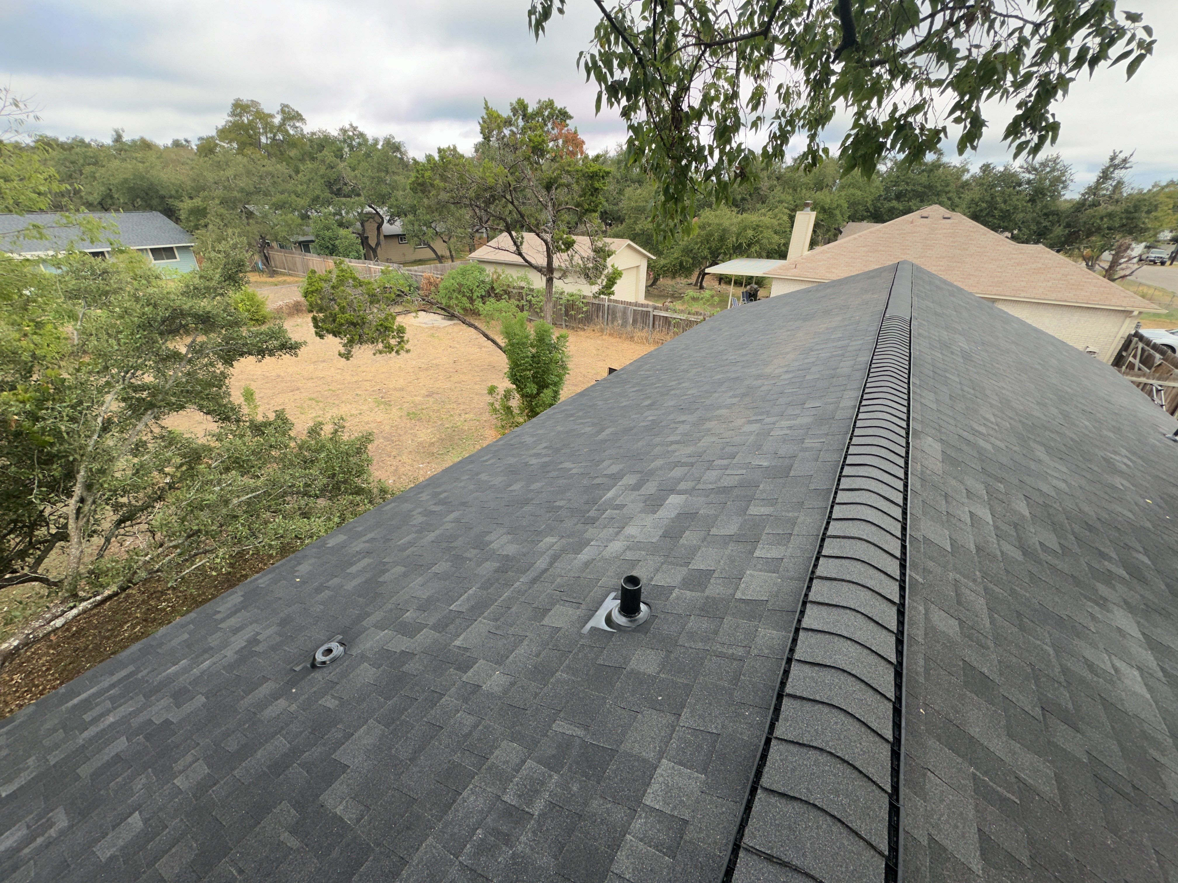 Charcoal Shingle Roof Replacement in Cedar Park by Skywall Construction LLC