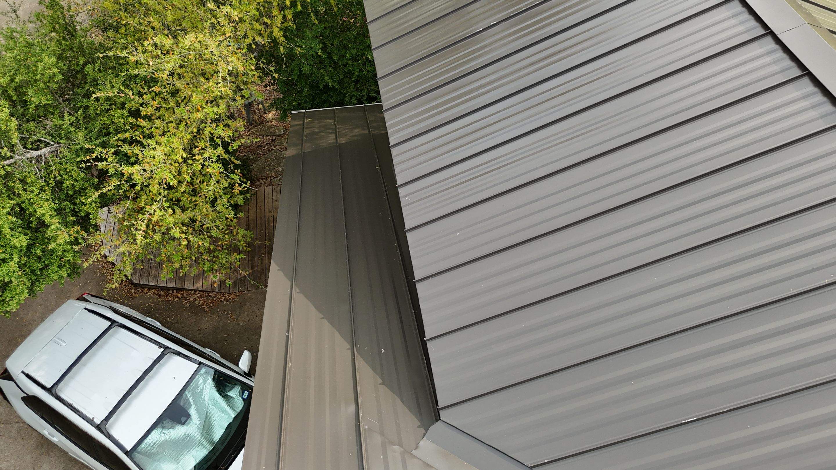 Dark Bronze - L&A Standing Seam with Striations by RoofsOnly.com