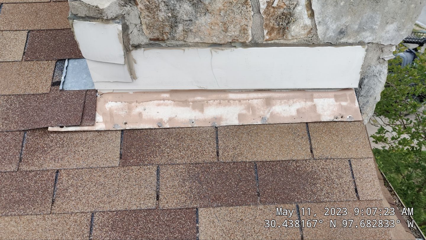 New Roof Installation Of IKO Dynasty Color Brownstone by DeZign Roofing & Exteriors
