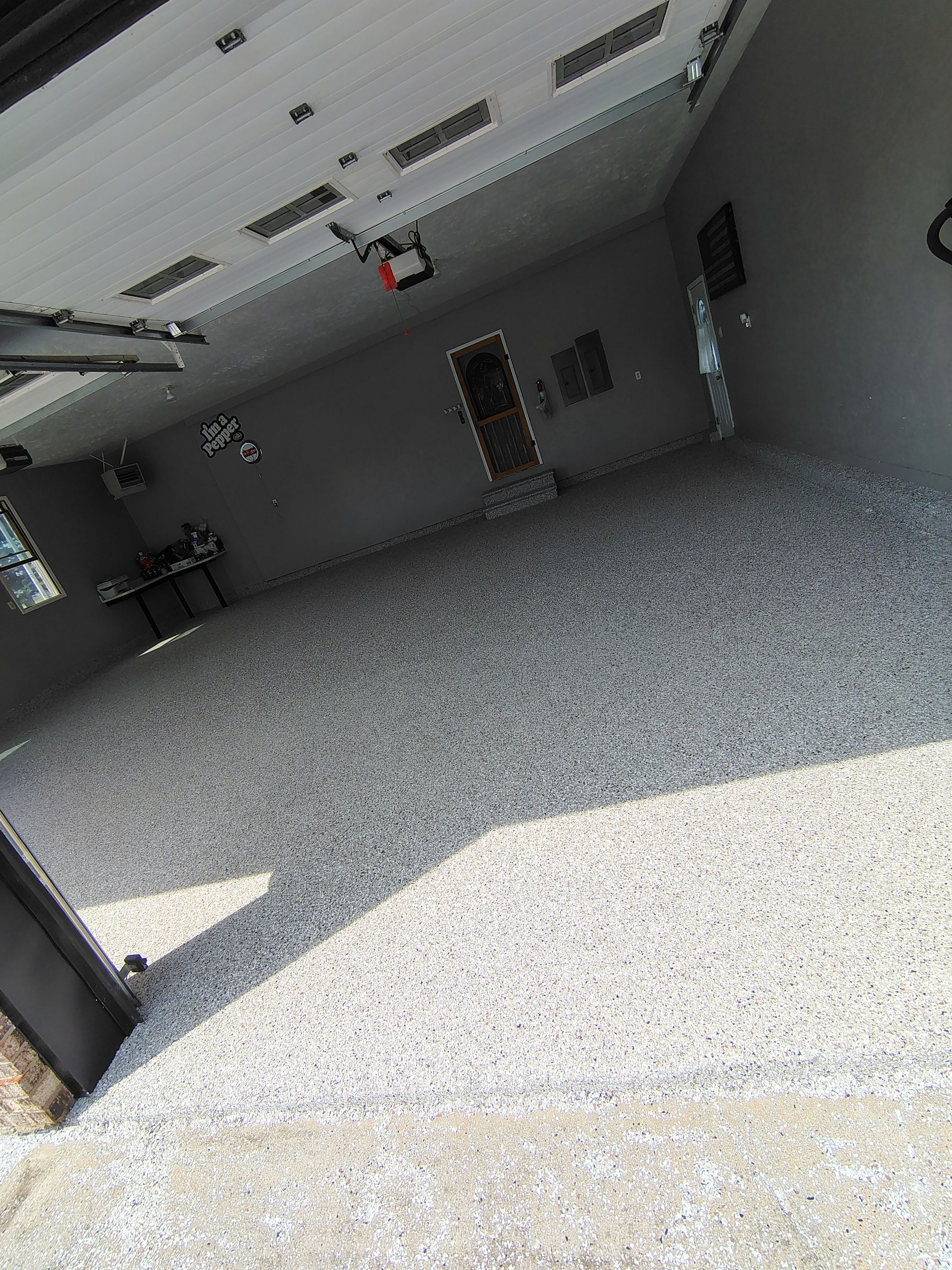 Garage Concrete Floor Coating and Crack Repair in Onawa by Select Painting, Coatings & Garage Cabinets