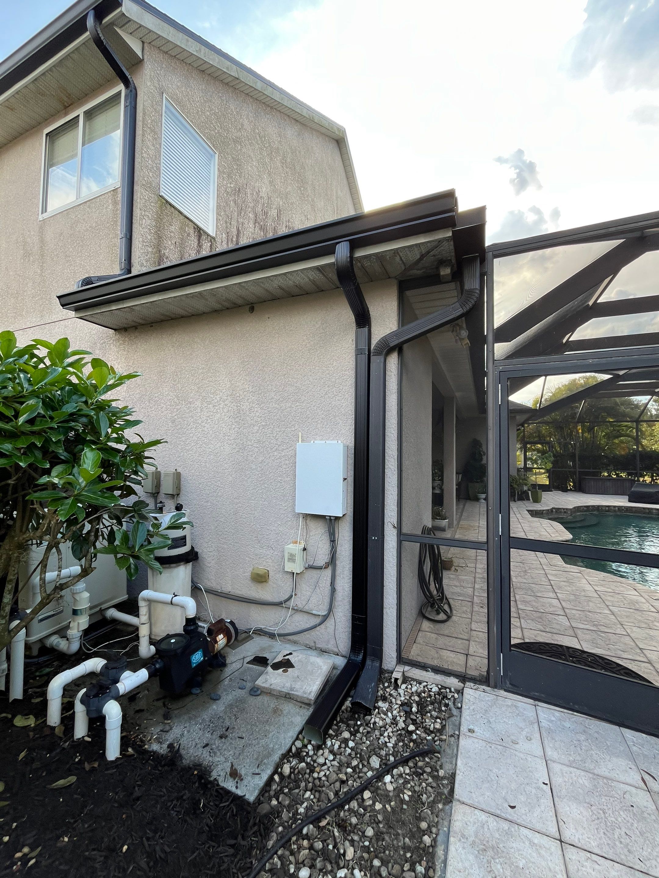 Black 6-inch Seamless Gutters for Modern Ellenton Homes FL by Gutter Professors