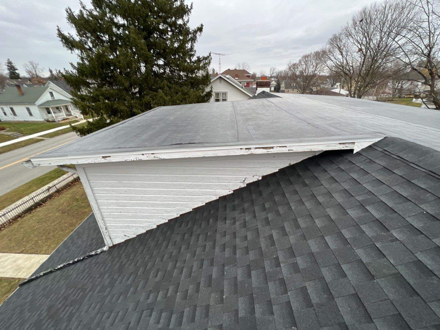 Residential Roofing Installation using 60 mil rubber roof by Nitro Roofing and Construction