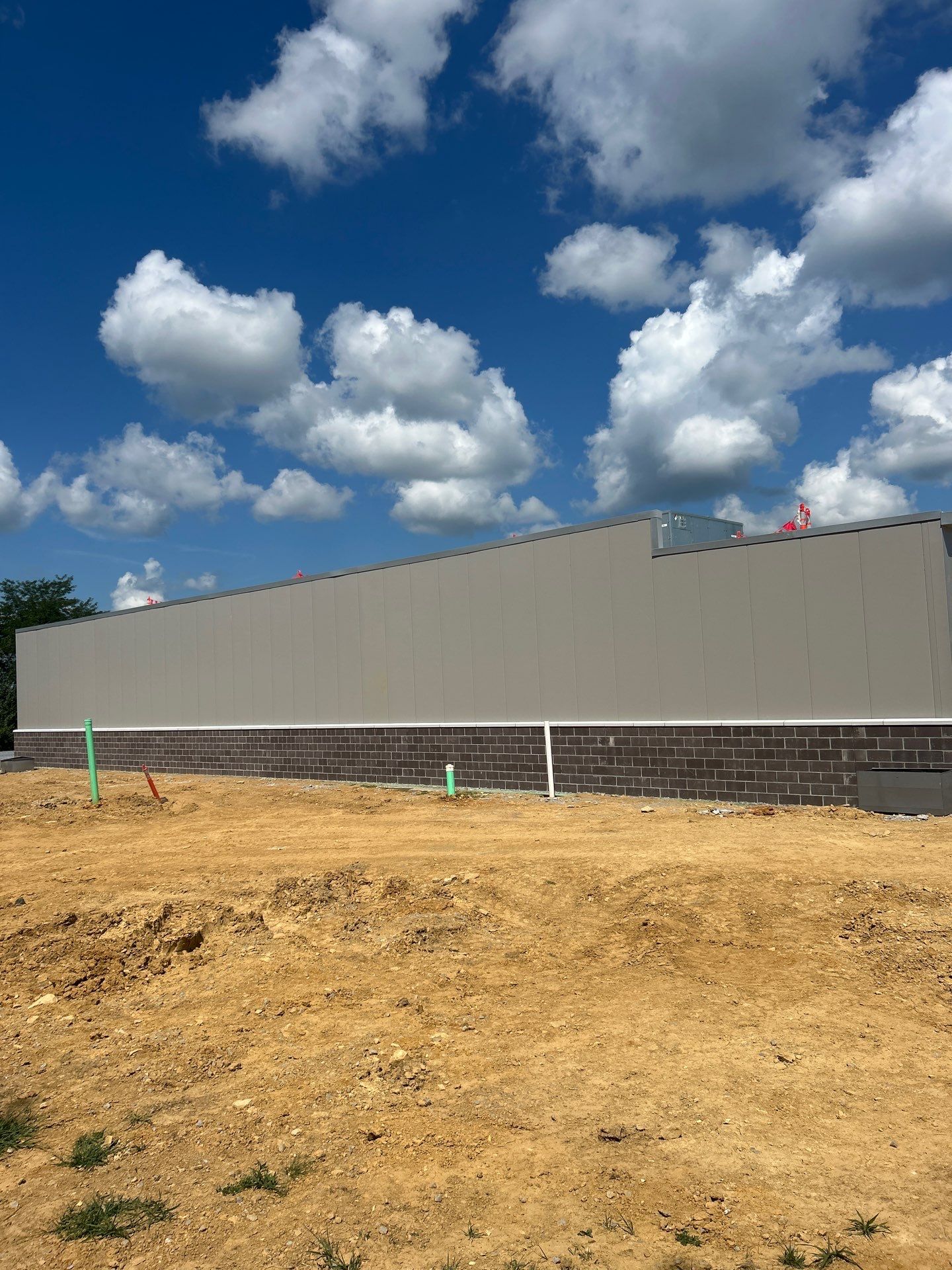 Commercial Siding  using Insulated roof and wall panels by Nitro Roofing and Construction