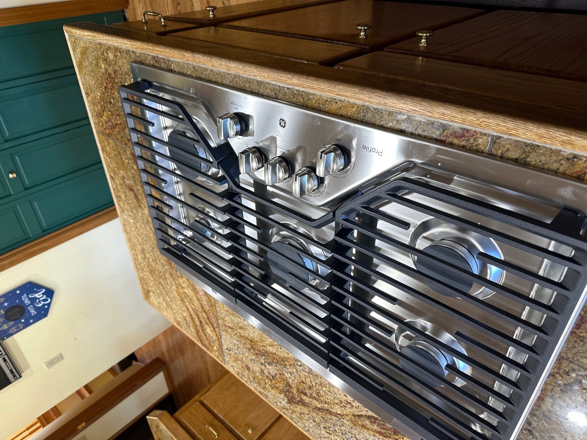 Dishwasher/ Gas Cook Top/ Pop Up Vent (Installation) by RoundHouse Installations