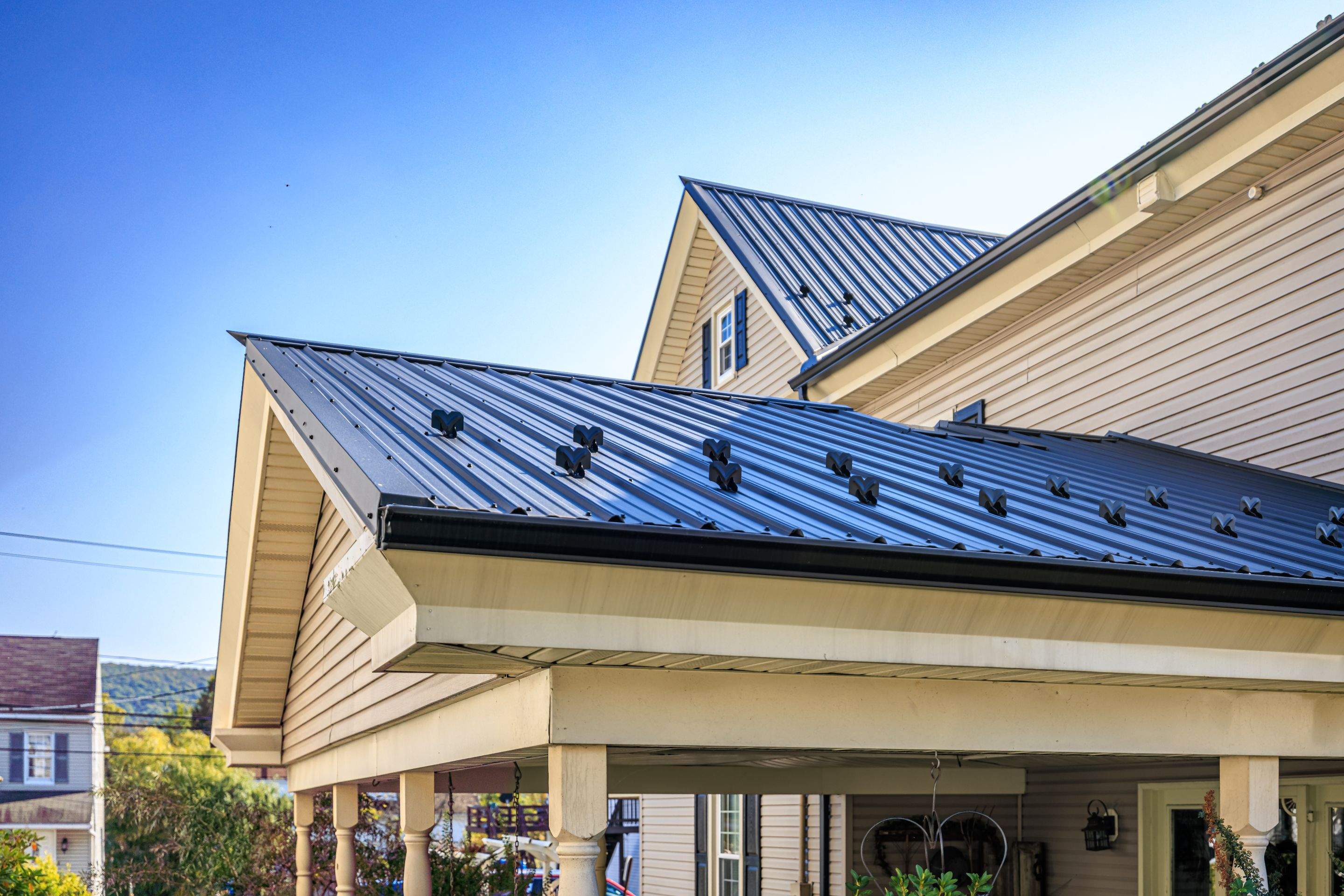 Textured Black Meal Roof by Esh Builders