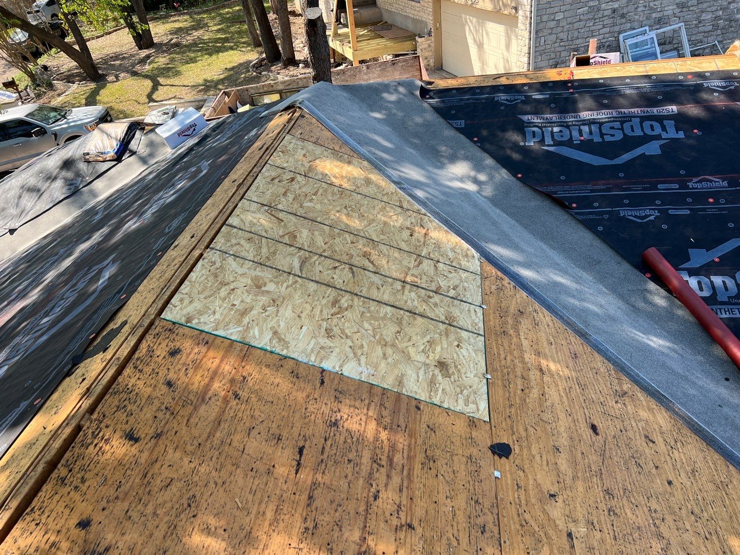 Winter storm 2023 with tree damage by Oakwood Roofing and Construction, LLC