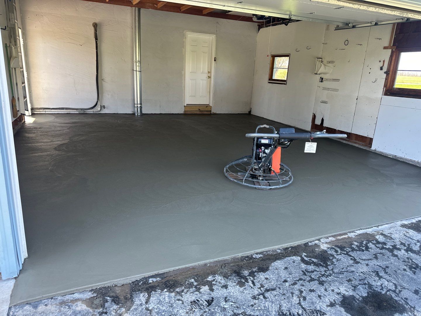 Concrete garage floor replacement by NG Masonry & Construction LLC