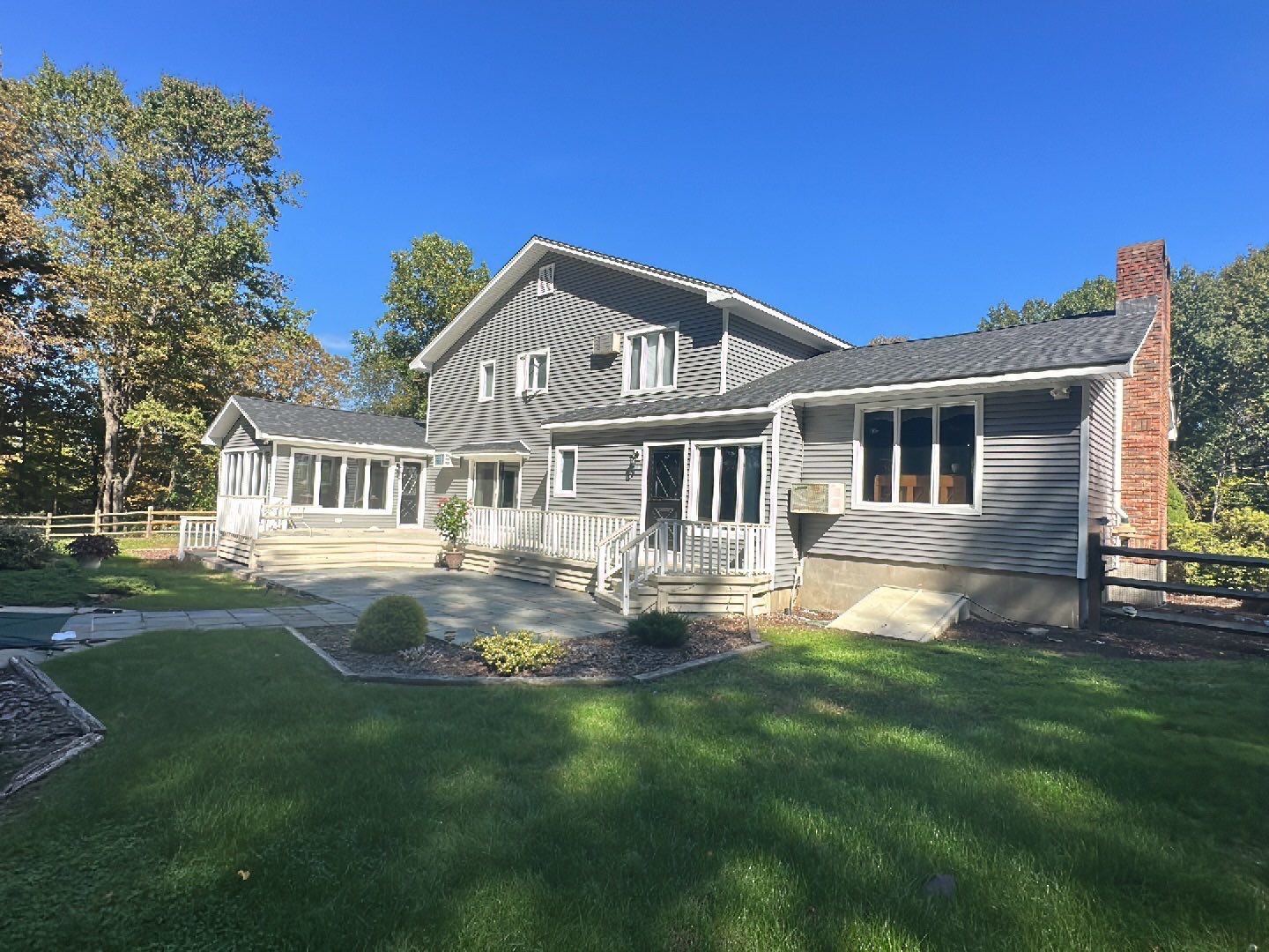 Residential Roofing Installation using Owens Corning TruDefinition Duration AR - Onyx Black & New Siding Using Mainstreet Charcoal Gray by A Plus Exterior