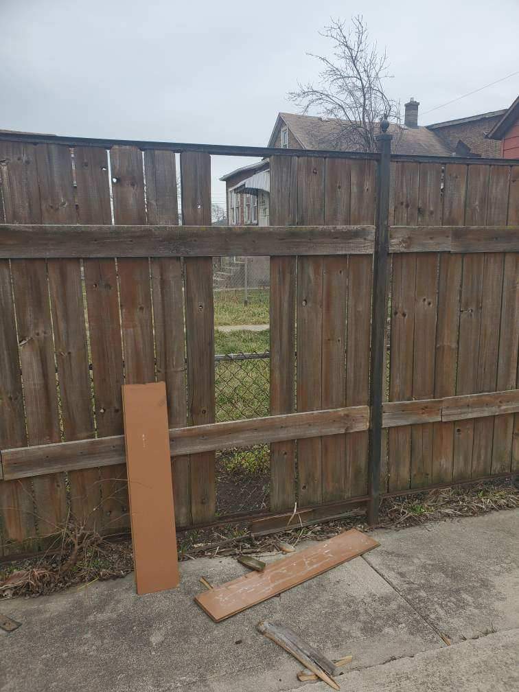 Fence Installation using pressure treated lumber  by INQUSE GENERAL CONTRACTOR