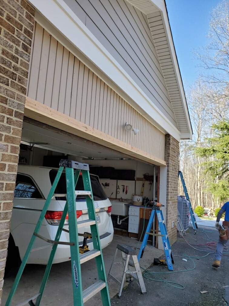 Roof, Siding, Door, and gutter replacement by American Home Contractors