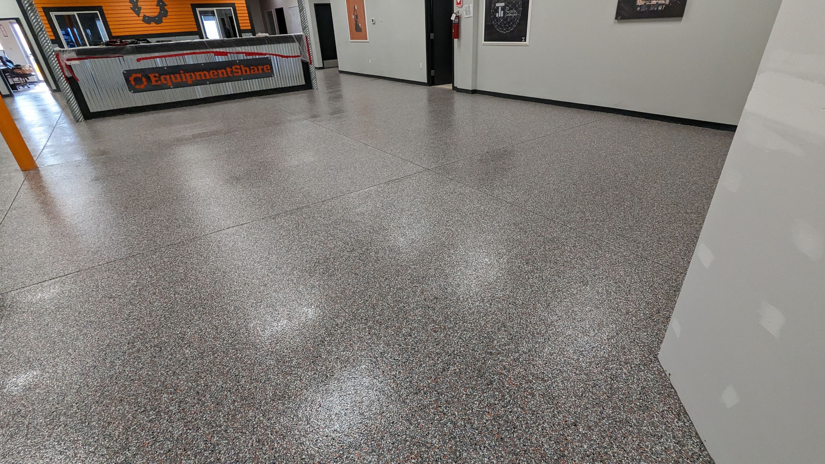 Equipment Share Commercial Floor Transformation using Smoke w/ 5% Orange by Croc Coatings, LLC