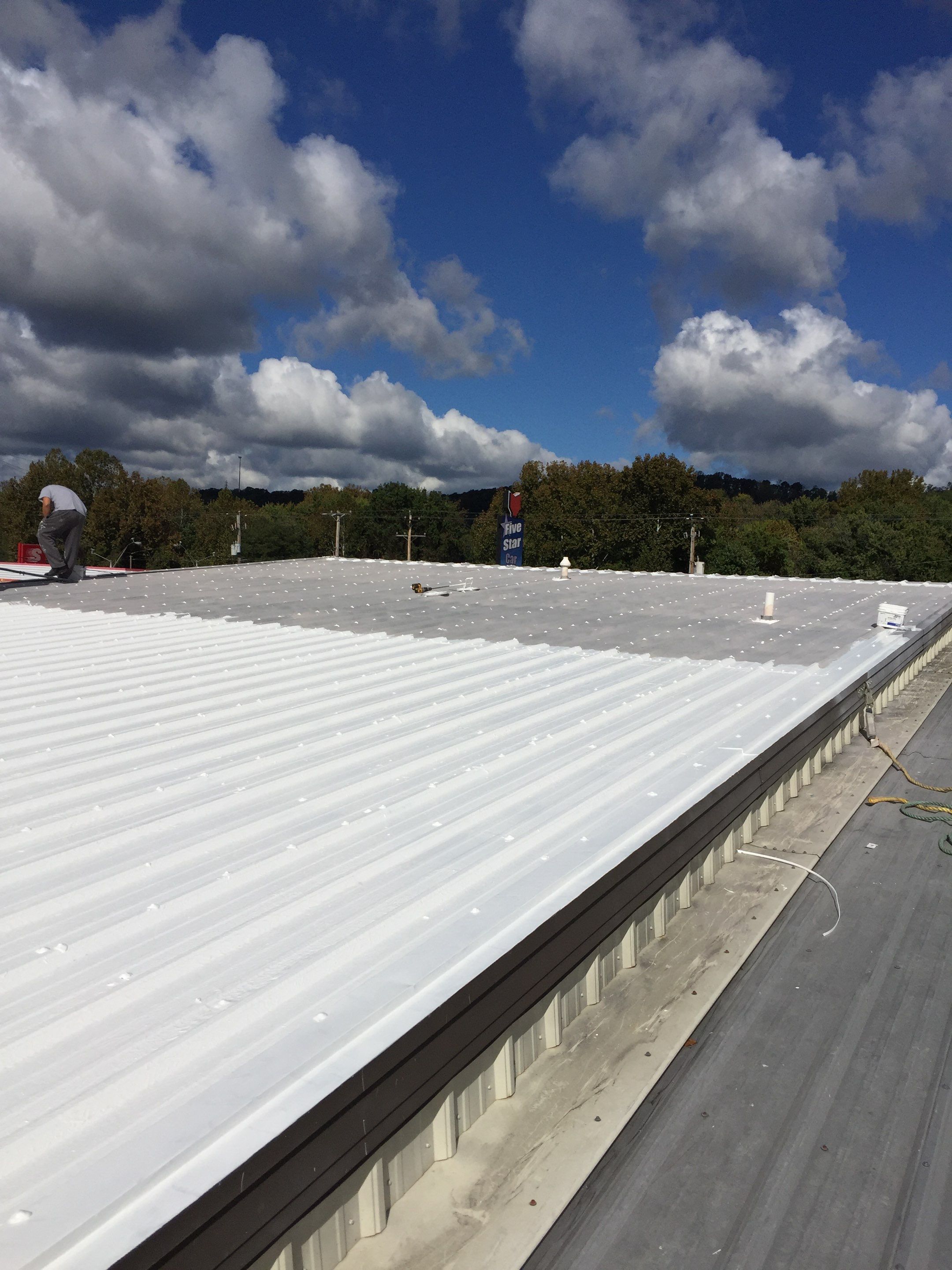 Commercial Roof Coating using Gaco Silicone Roof Coating by Secure Construction Company Inc