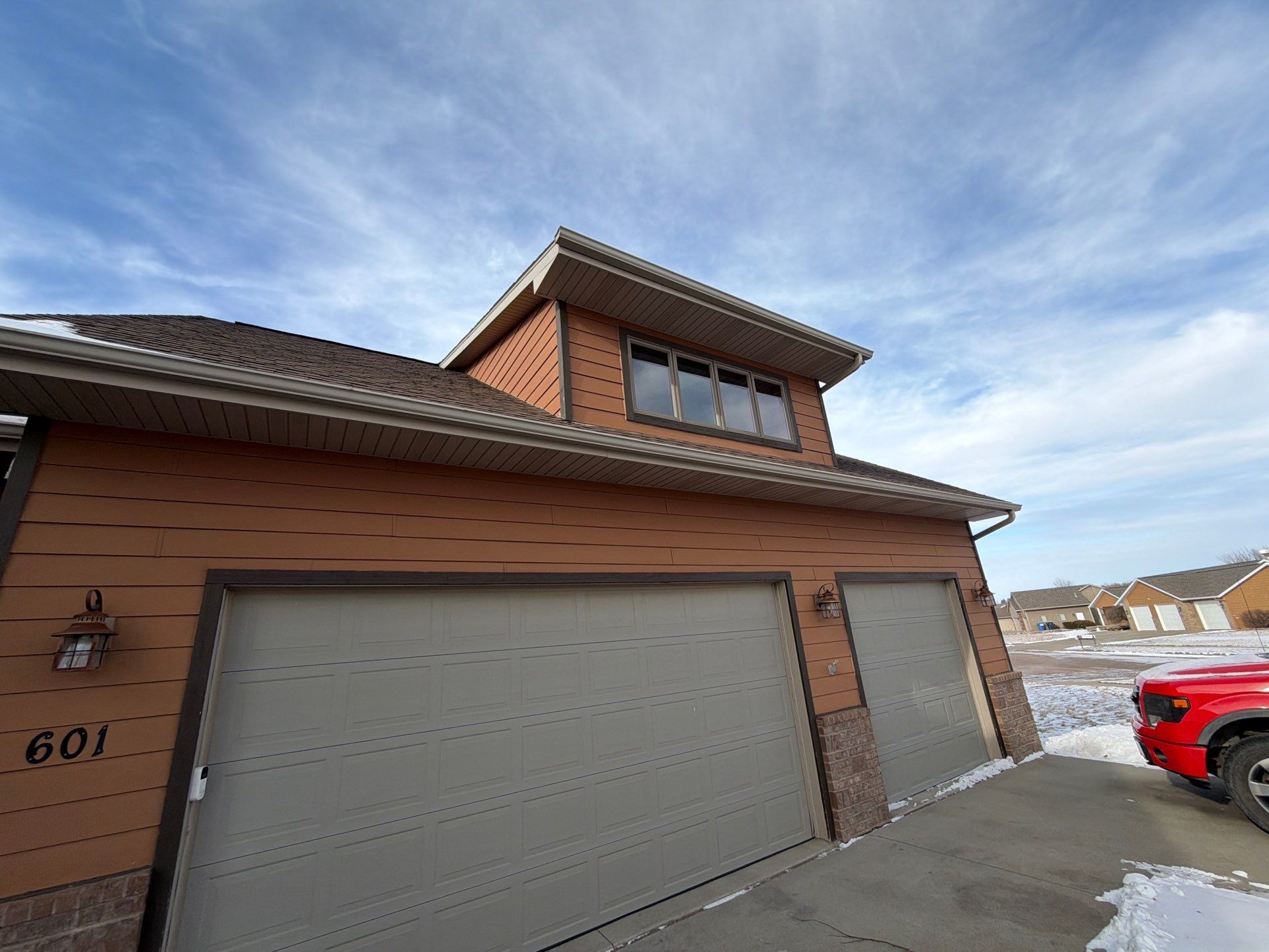 Residential Exterior Painting and Siding Restoration in Crooks by Select Painting, Coatings & Garage Cabinets