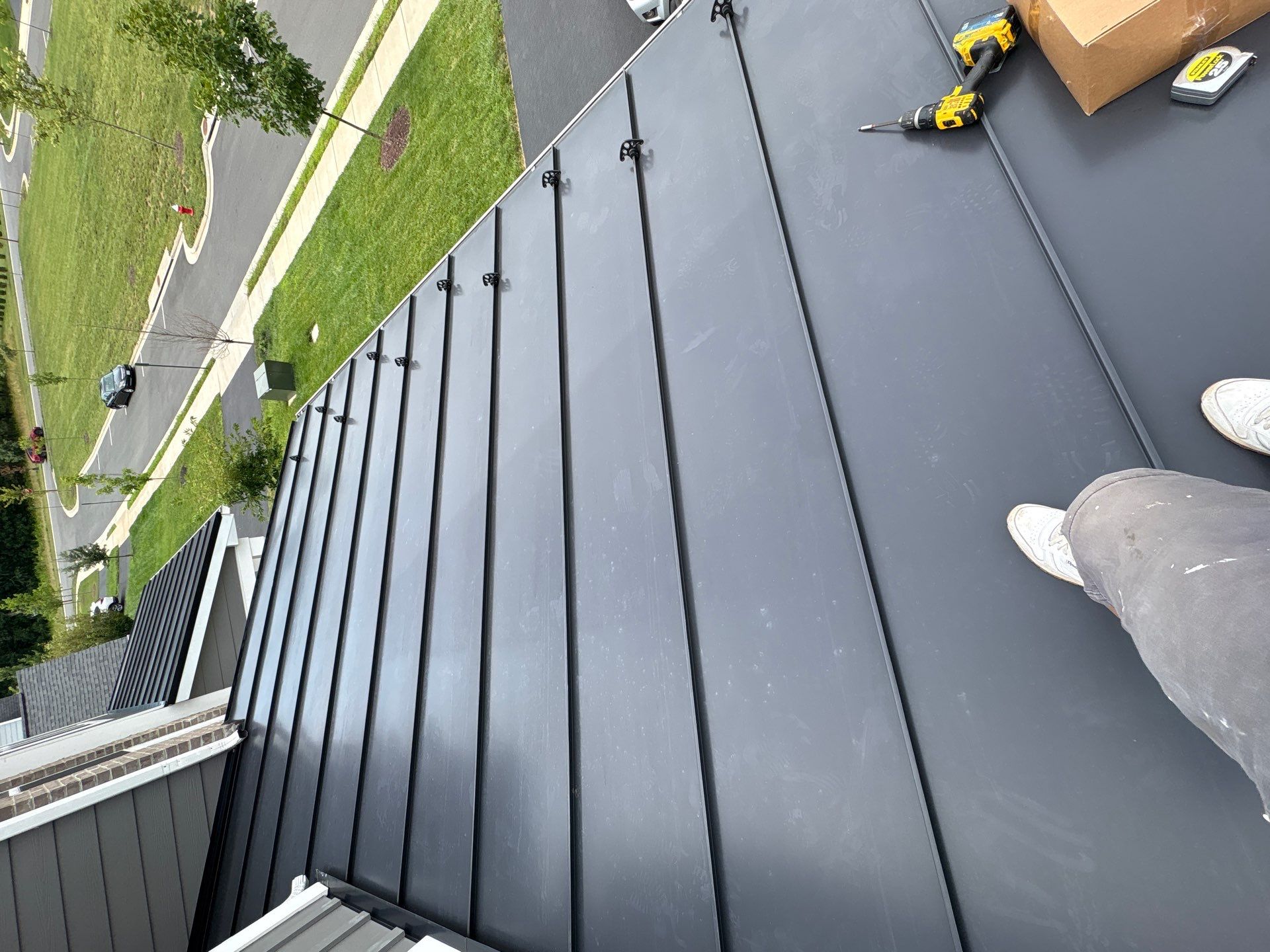 Matte Black Snow Guard Installation for Metal Roofing in Aldie by Contracting Bros Llc