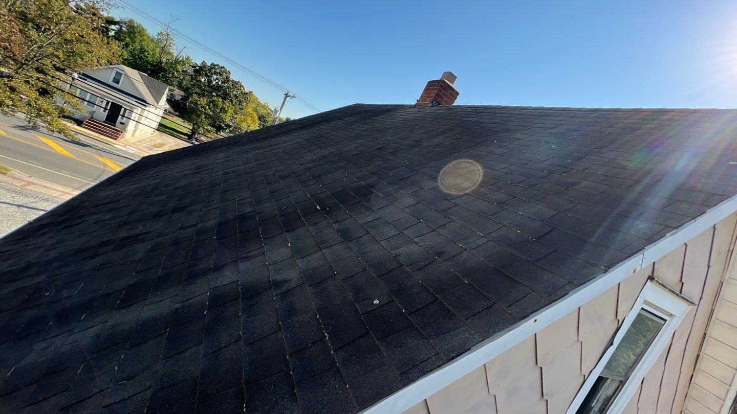 Onyx Black Shingles by Reimagine Roofing