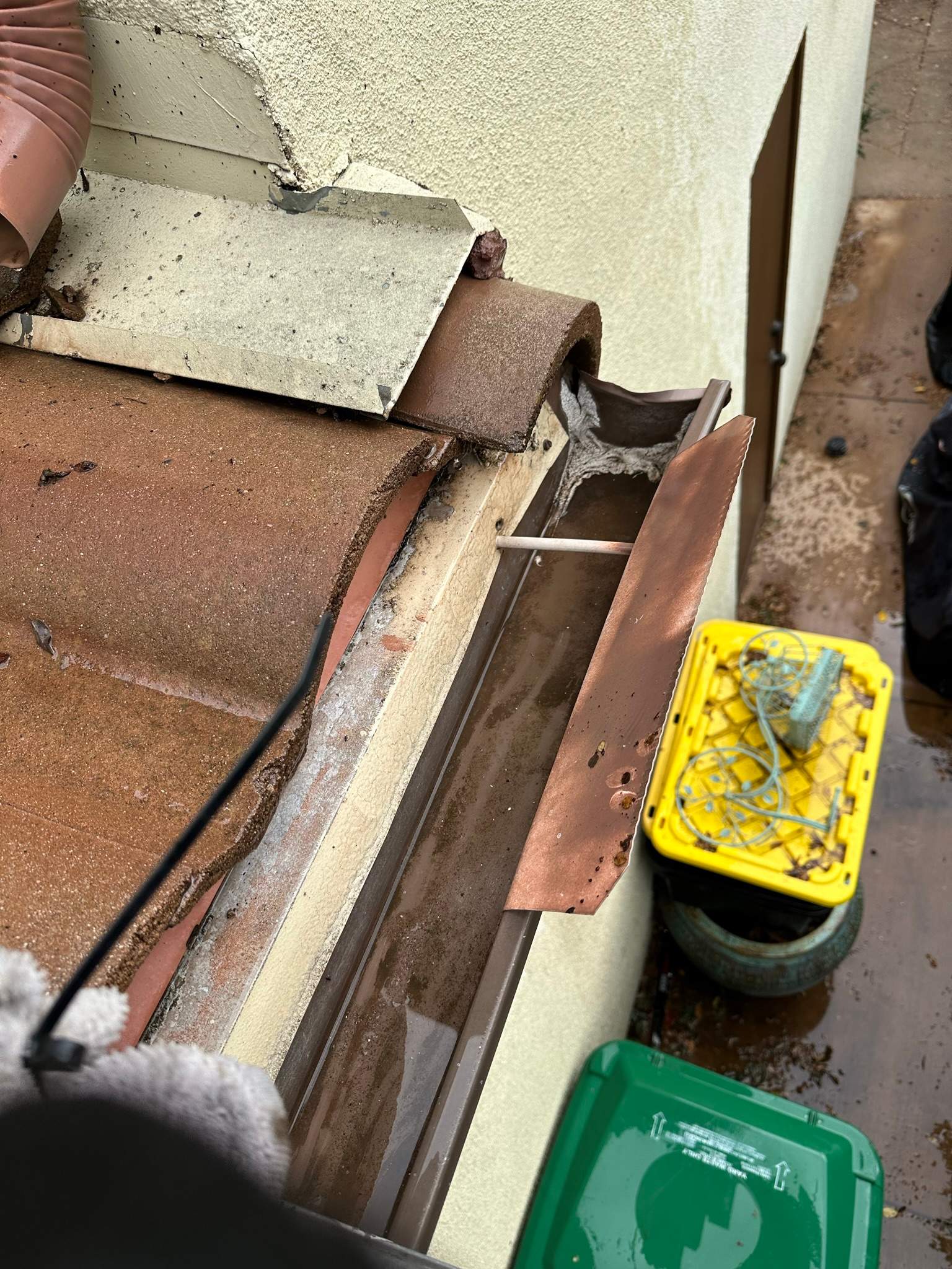 Clogged gutters at this Irvine home in Woodbury by Property Cleaning Experts, LLC