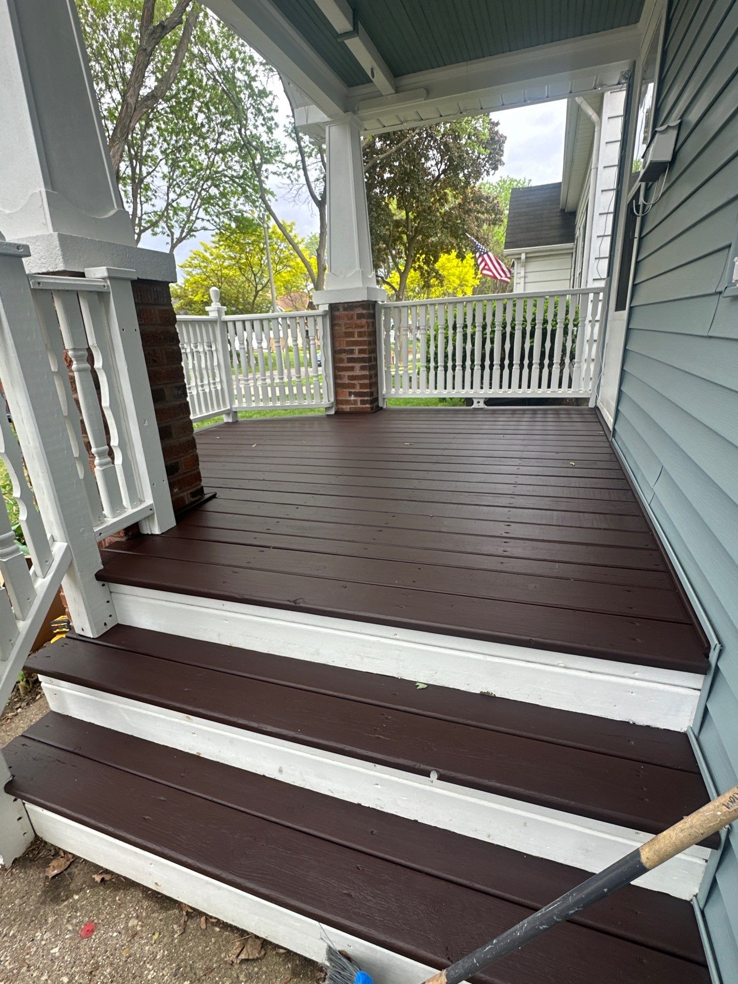 Exterior Porch Restoration and Privacy Fence Staining in Wauwatosa by OCS Contracting Services
