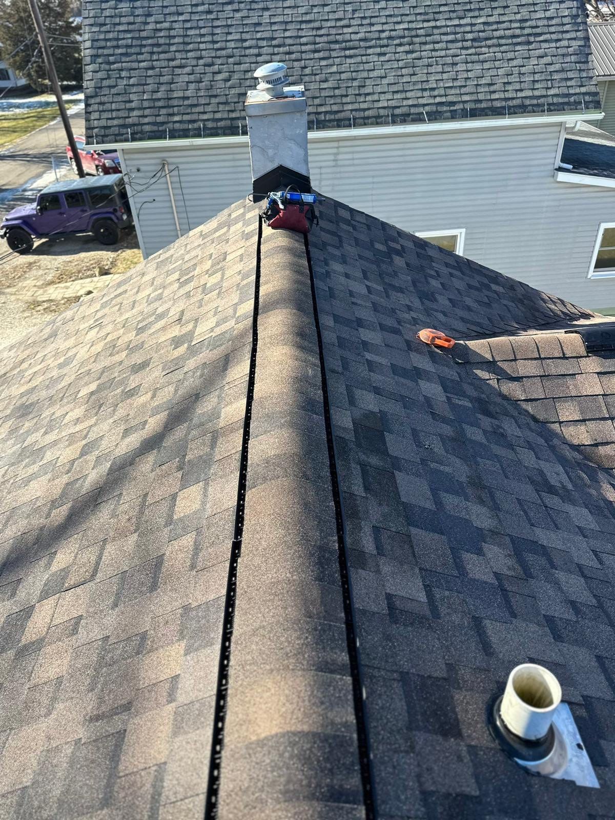 Sharkey Roof by Erie Home