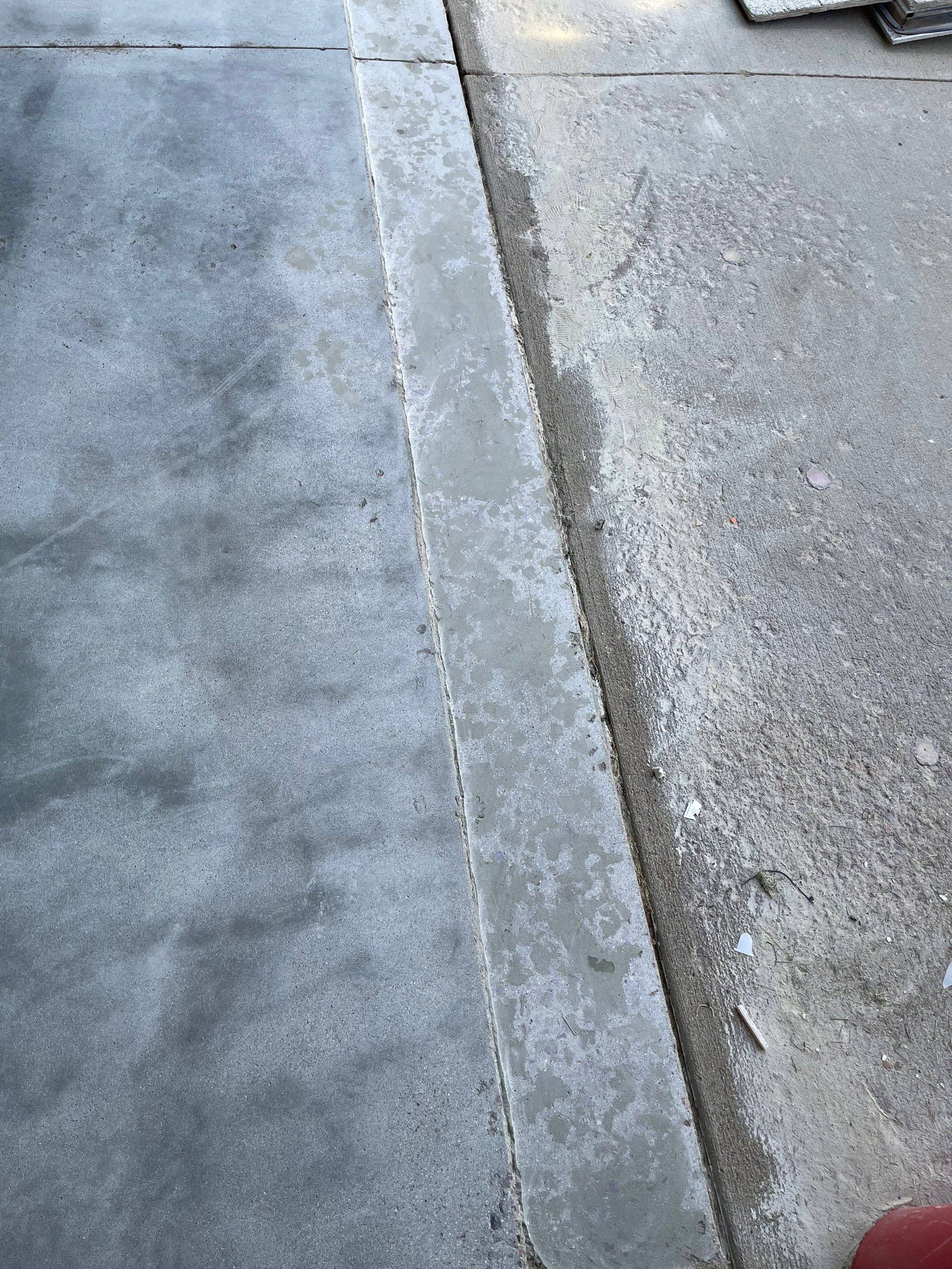 Cabin FEver Flake Garage Floor Coating Installation in Sioux Falls by Select Painting, Coatings & Garage Cabinets