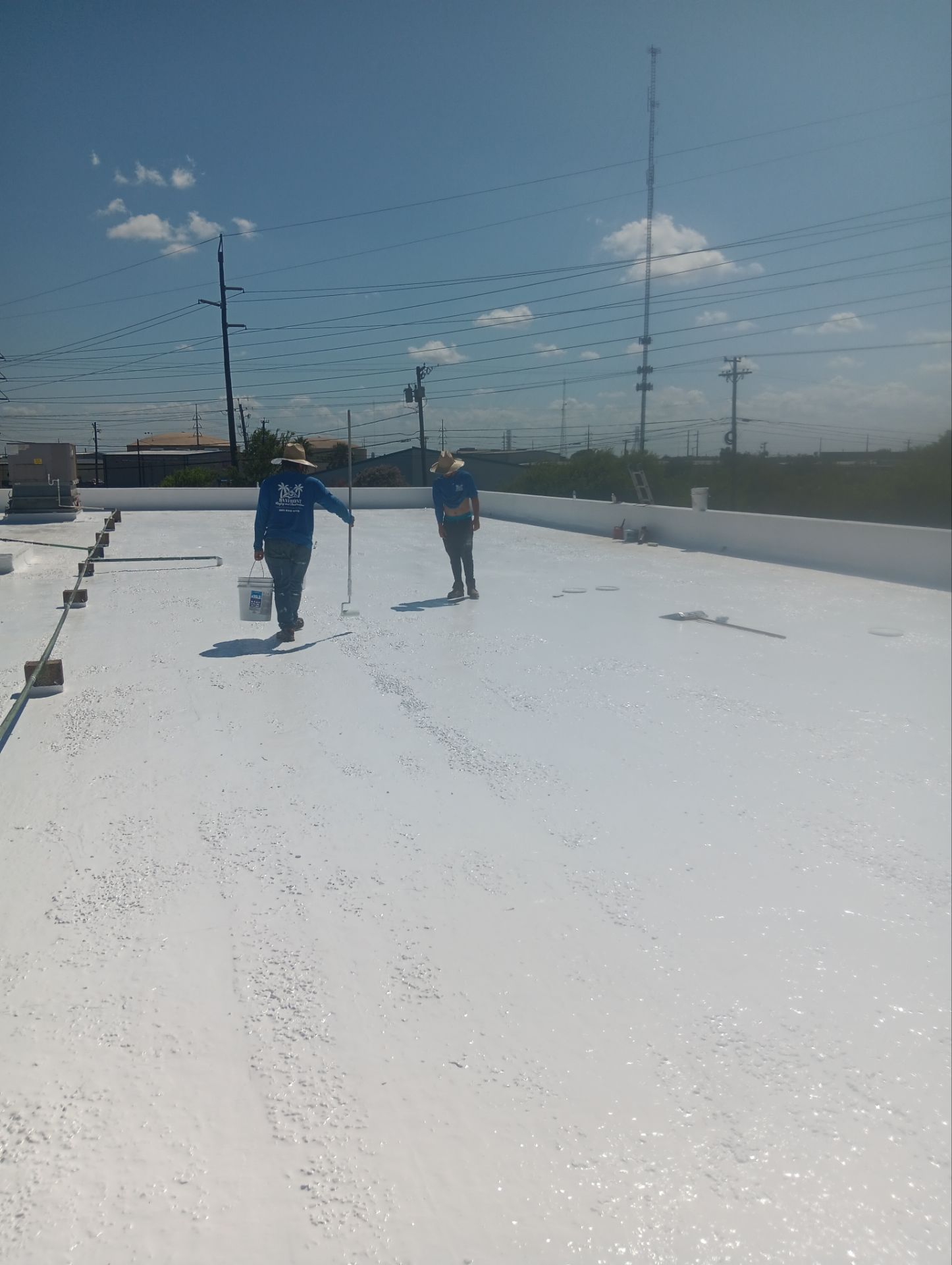 Dirty leaking Gravel Roof by Bayfront Roofing and Construction