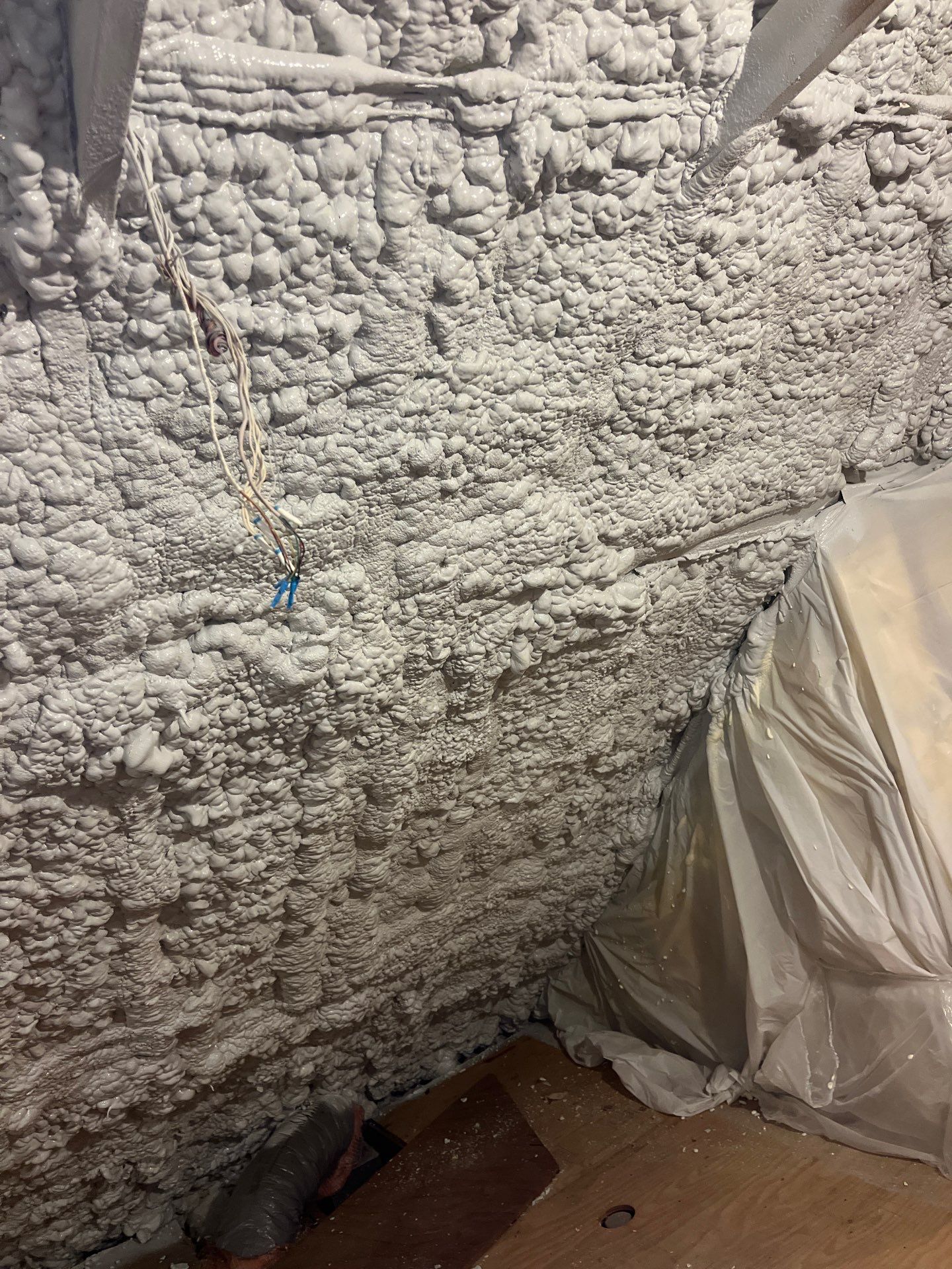Attic Retrofit using open cell spray foam by NYS Foam & Energy