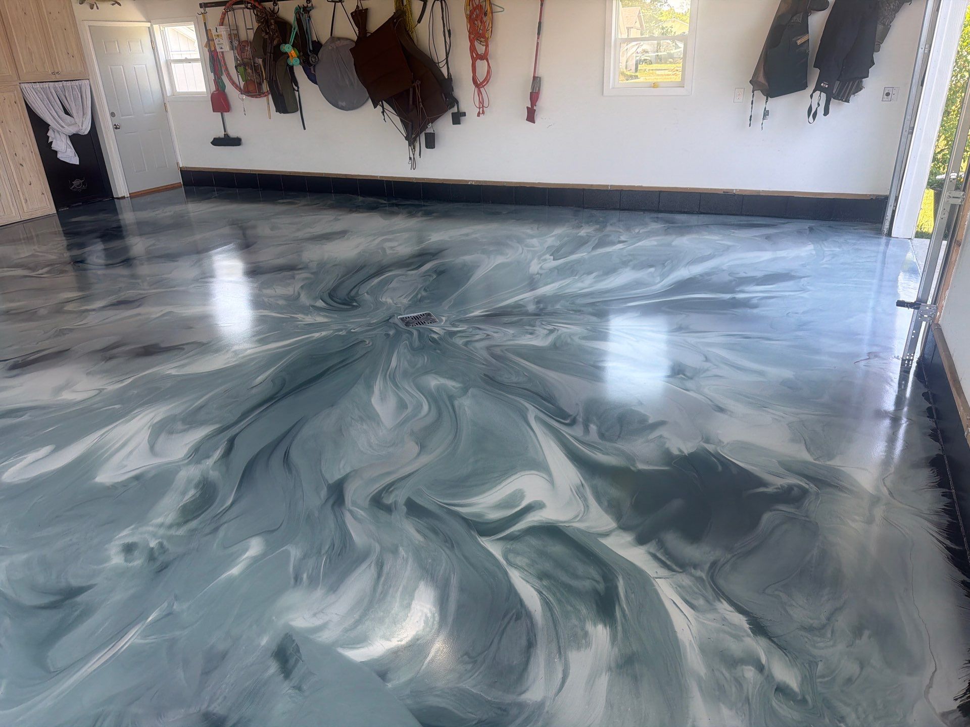 Custom Metallic Epoxy Floor and Polished Countertop Installation in Mears by Gordon Painting