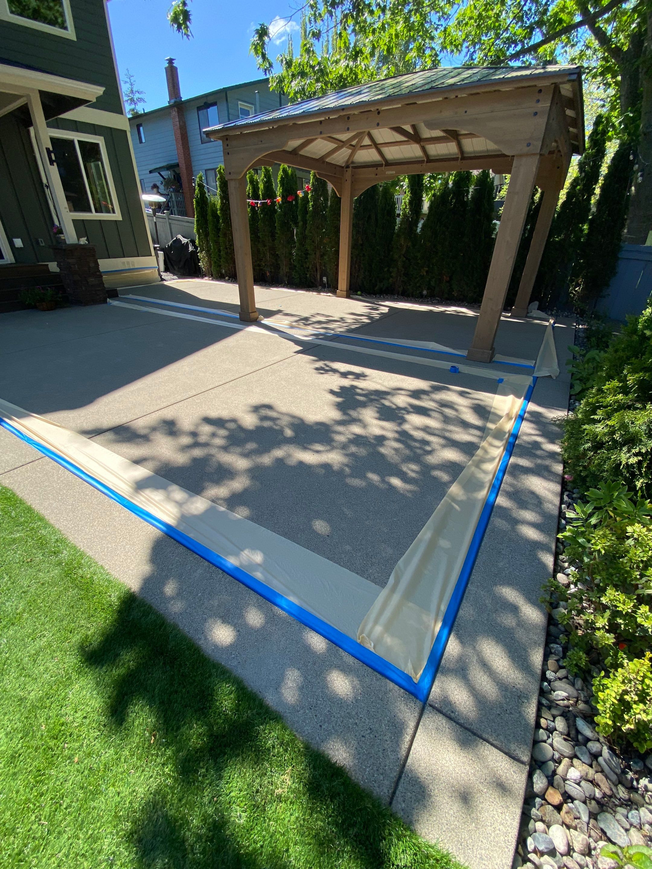 Patio Installation using Concrete, Retaining walls, and Turf install by Jireh Asphalt & Concrete Inc 