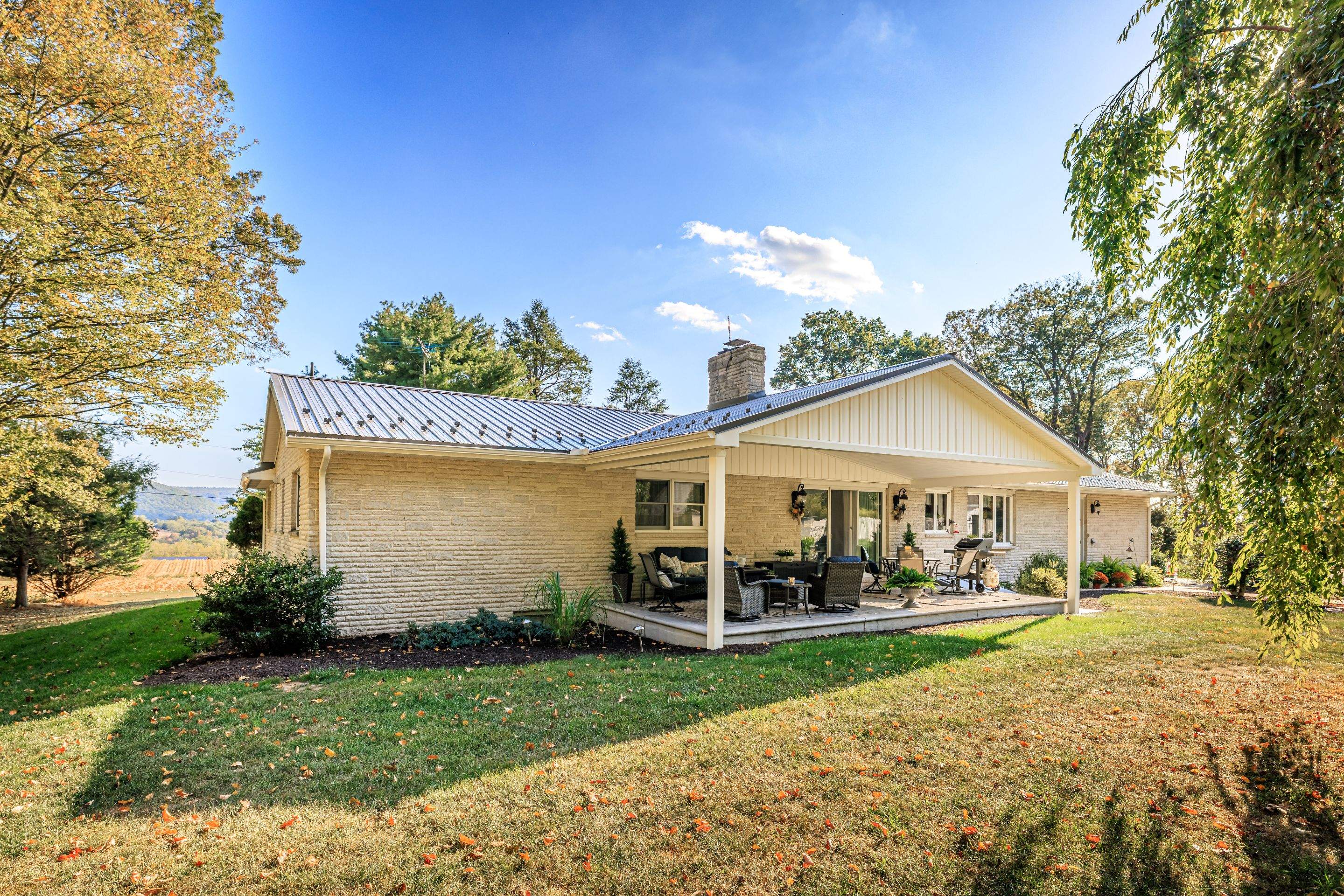 Metal Roof and Gabled Porch Addition in Hegins by Esh Builders