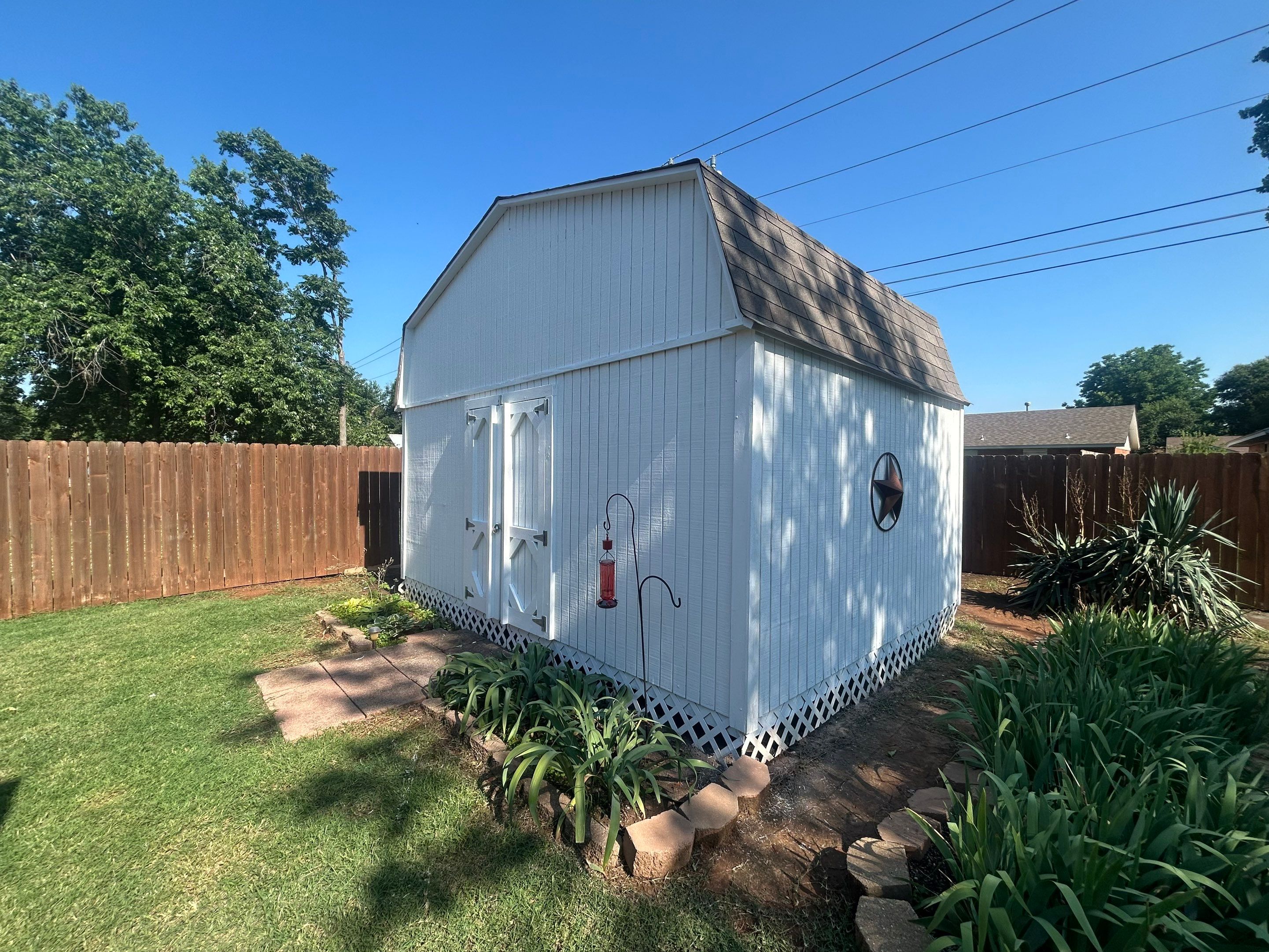 barn roof repair and solar tube replacement in Mustang by McCann's Roofing and Construction