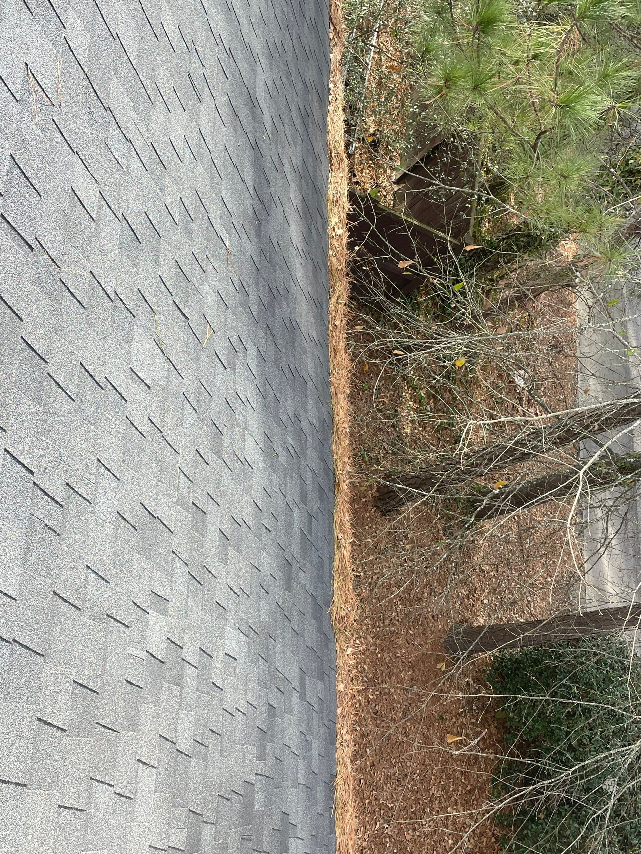 Cleaning Gutters  by Deerfield Roofing LLC