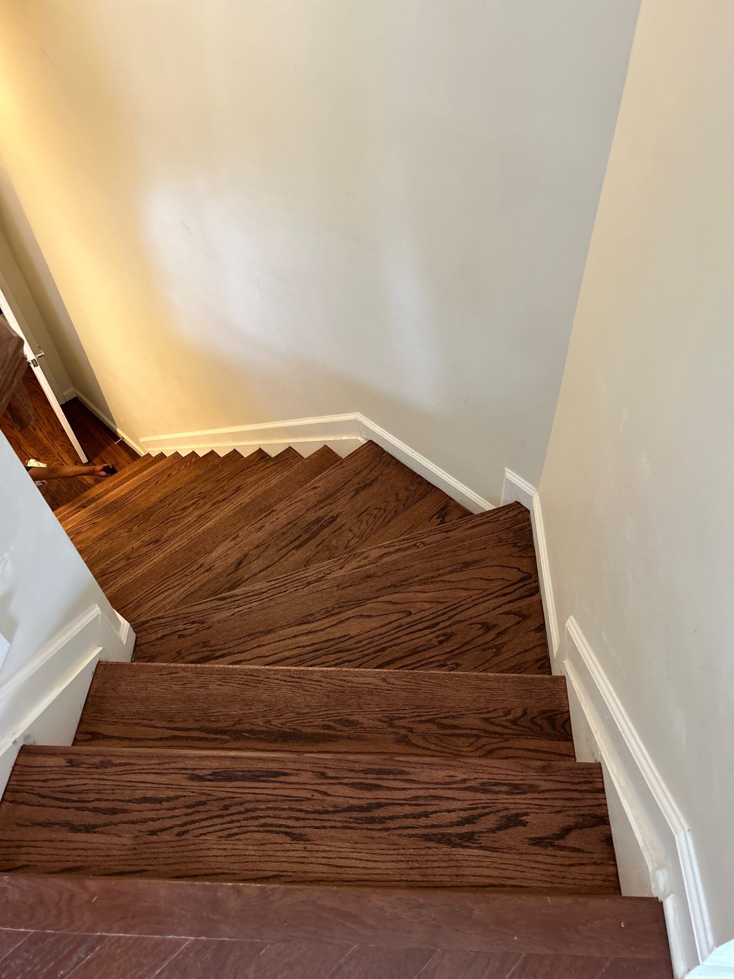 UPGRADE to solid oak stair treads by Footprints Floors of East Atlanta