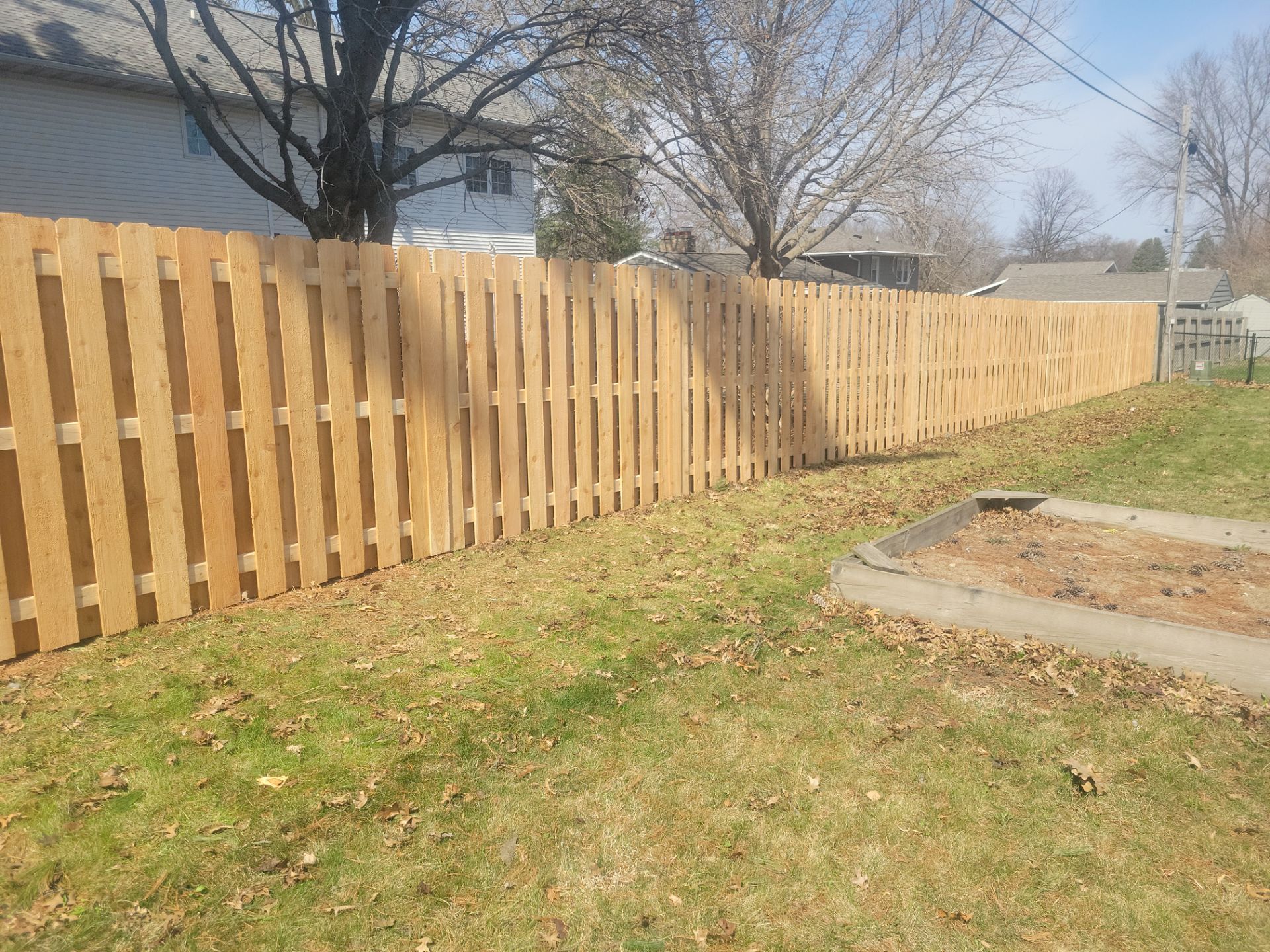 Cedar Shadowbox Wood Privacy Fence Installation in Cedar Falls by Perfect Picket Fence and Stain