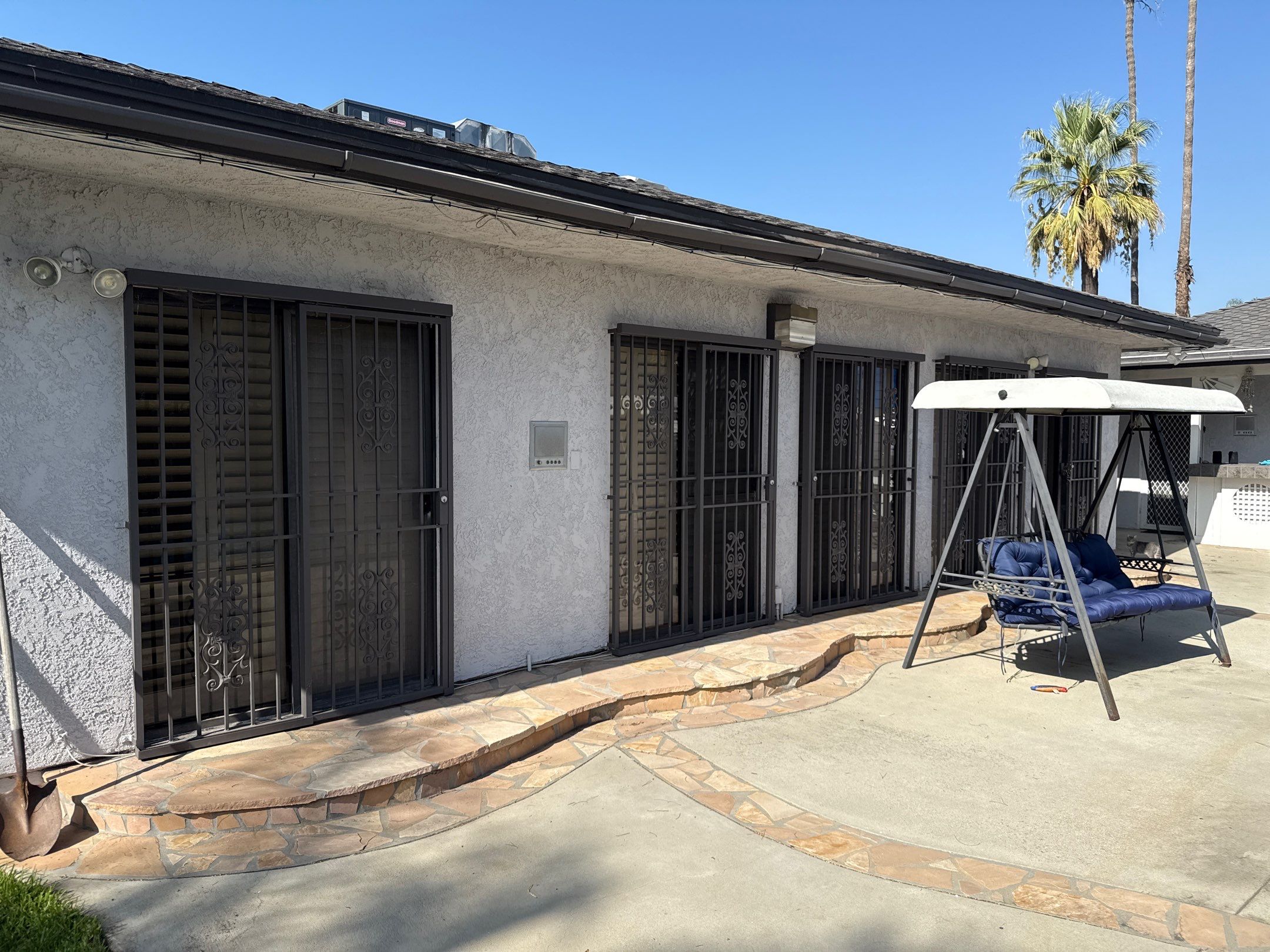 New Dark Frame Milgard Window and Sliding Door Installation in Covina by American Window Company