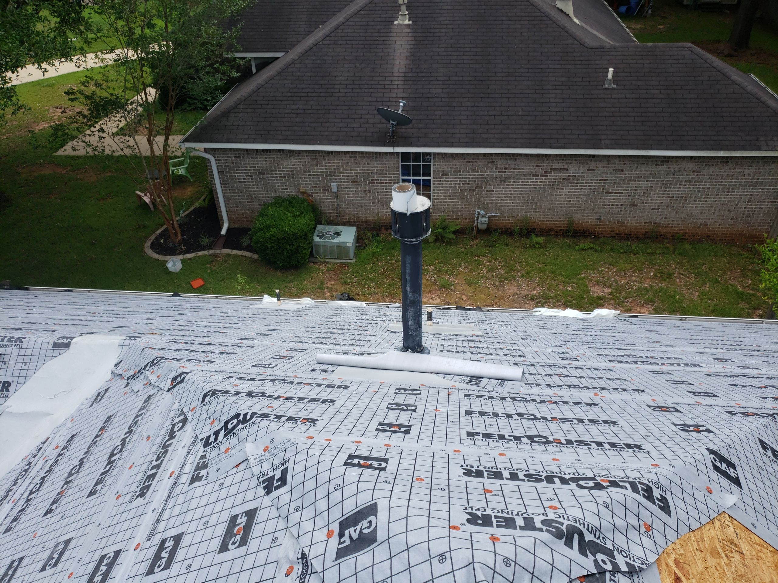 Residential Roofing Installation using Roof Replacement by American Roofing & Construction LLC