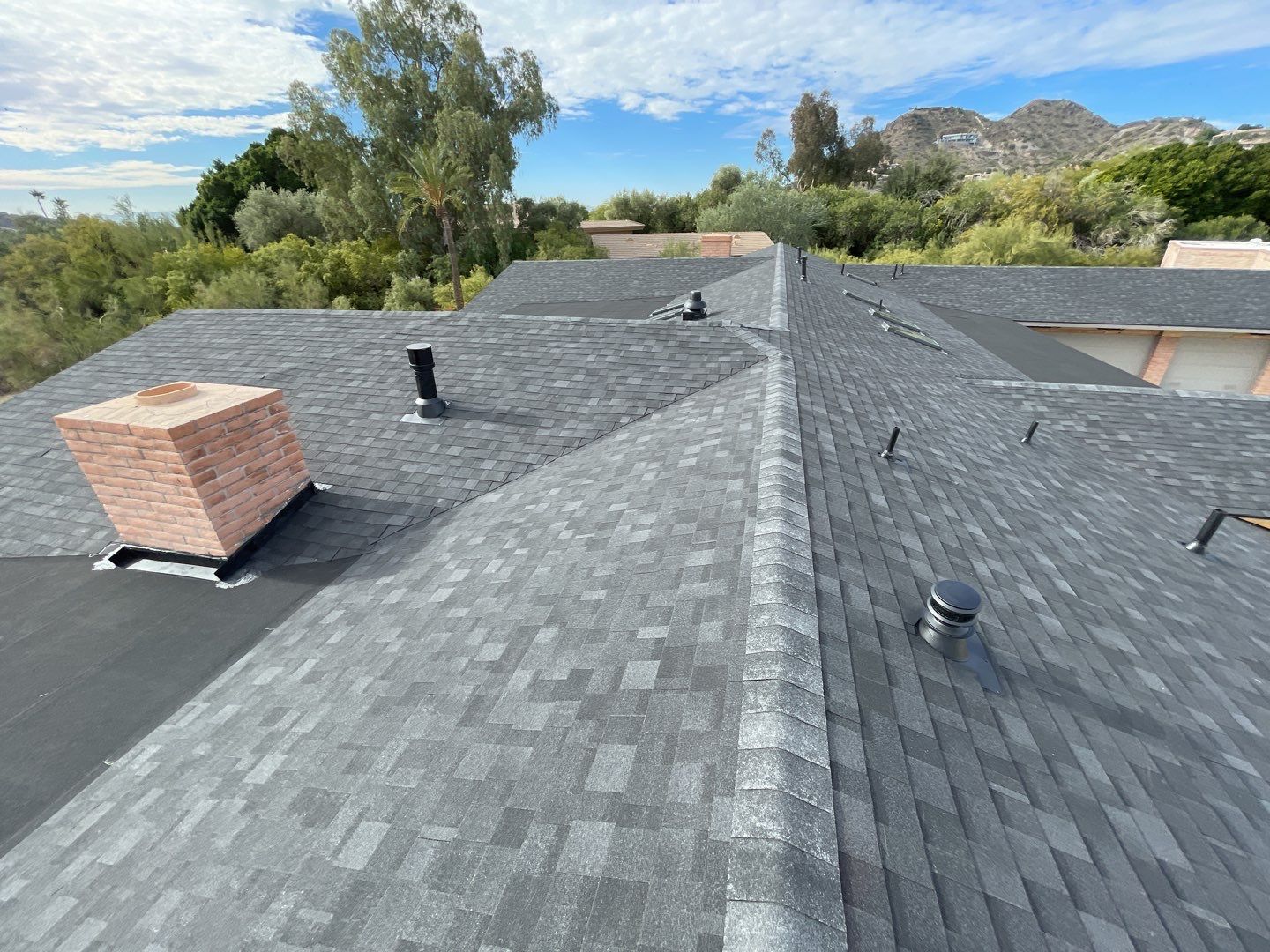 Onyx Black Shingles by Reimagine Roofing
