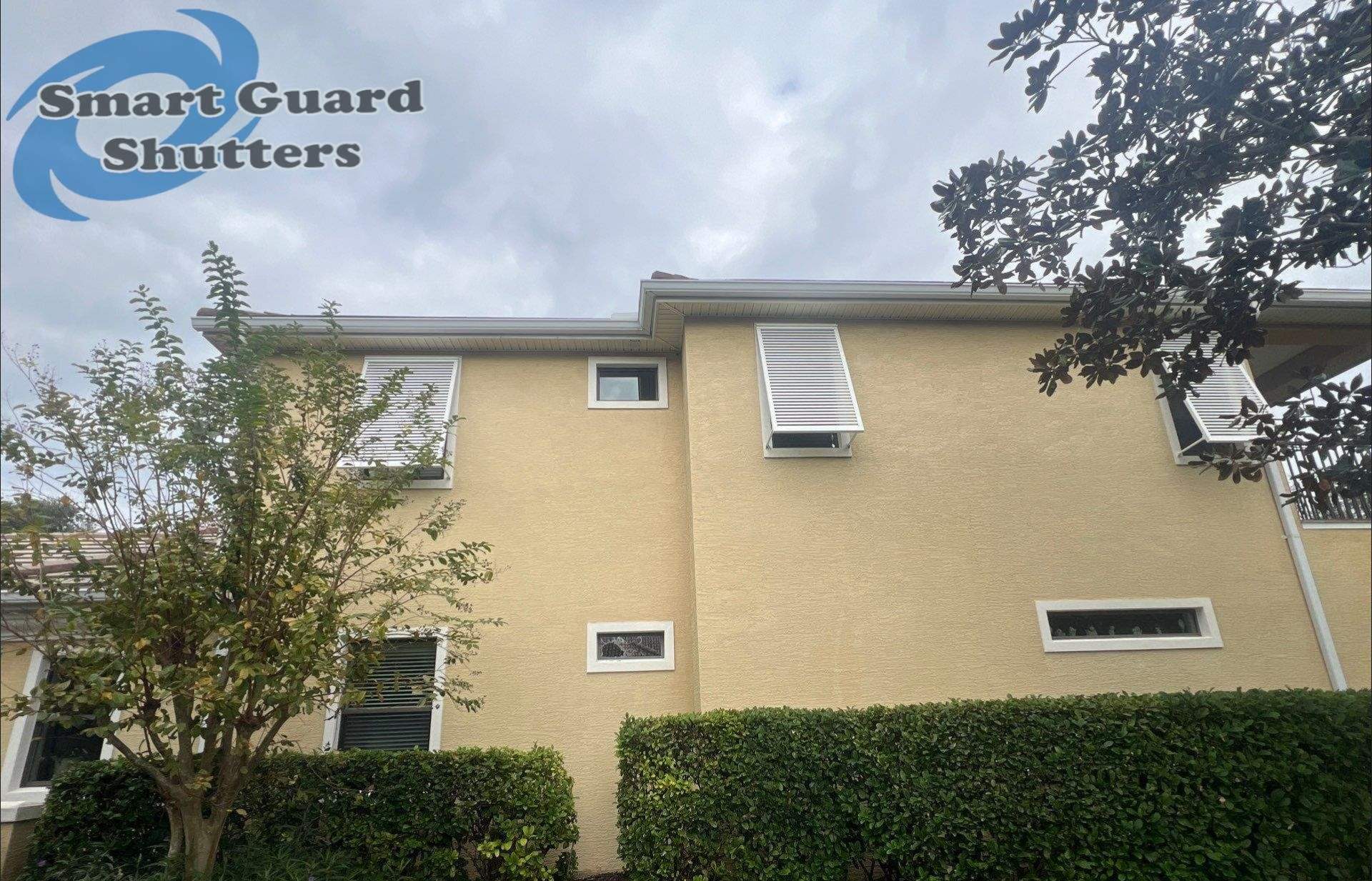 Decorative Bahamas in Traffic White  by Smart Guard Shutters