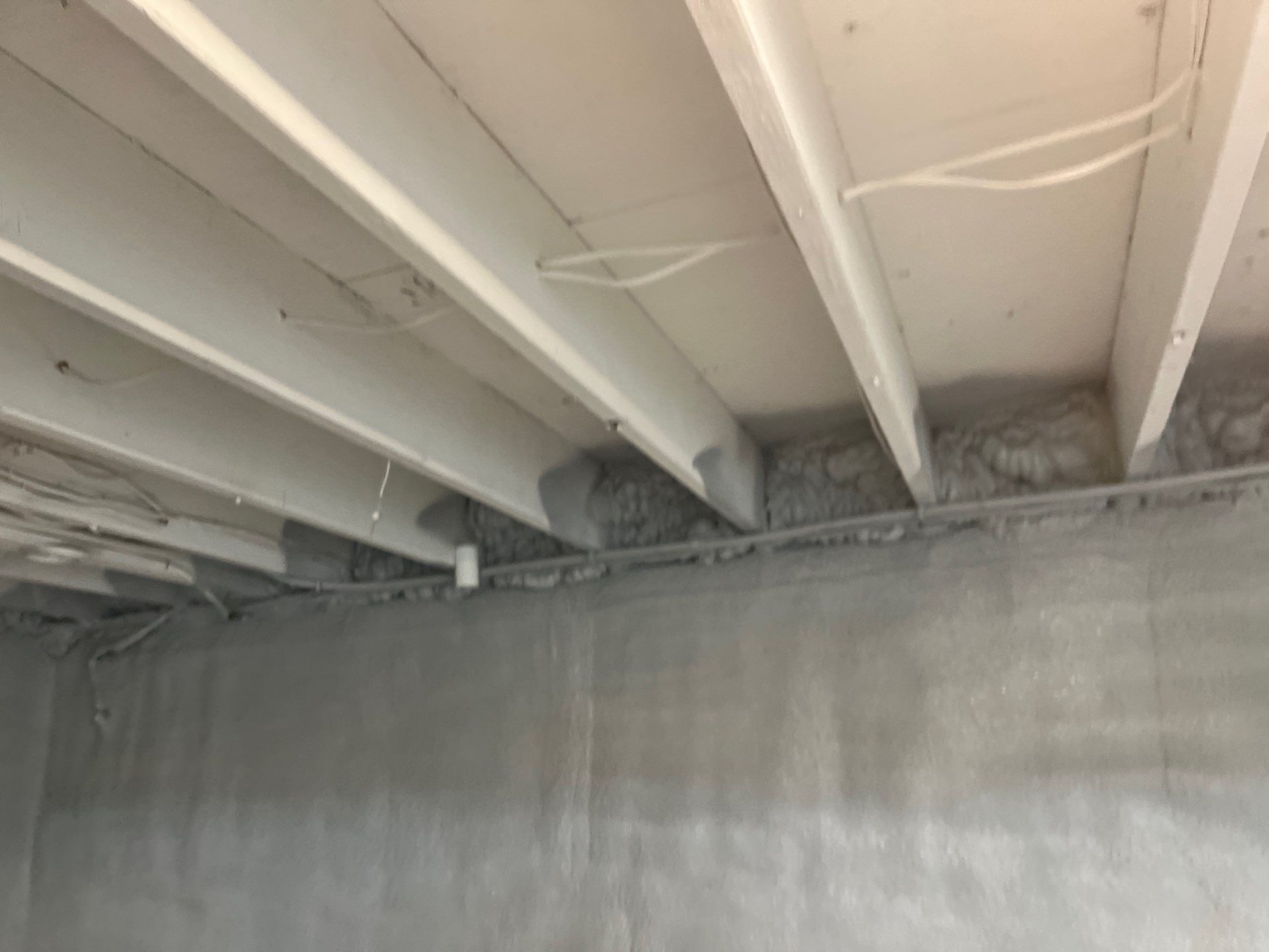 Basement Exterior Walls using Closed Cell Spray Foam by NYS Foam & Energy
