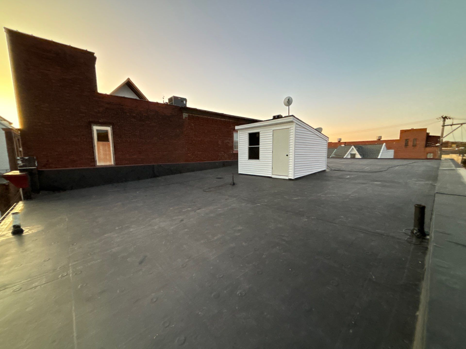 Commercial Roofing Installation using EPDM Rubber Roofing by Roof Ninja LLC 