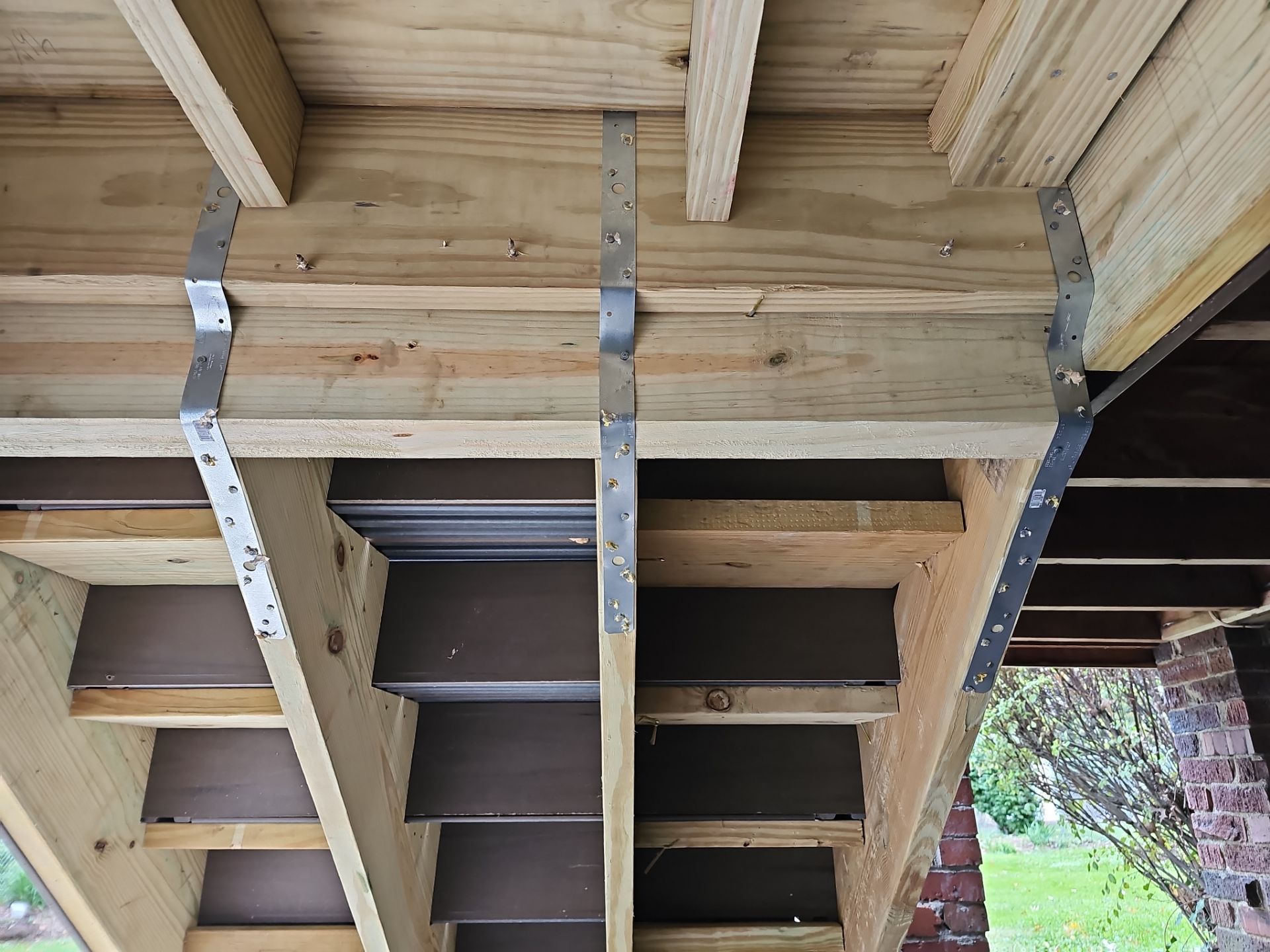 Stamped concrete and redeck  by Cousins Roofing Siding & Decks