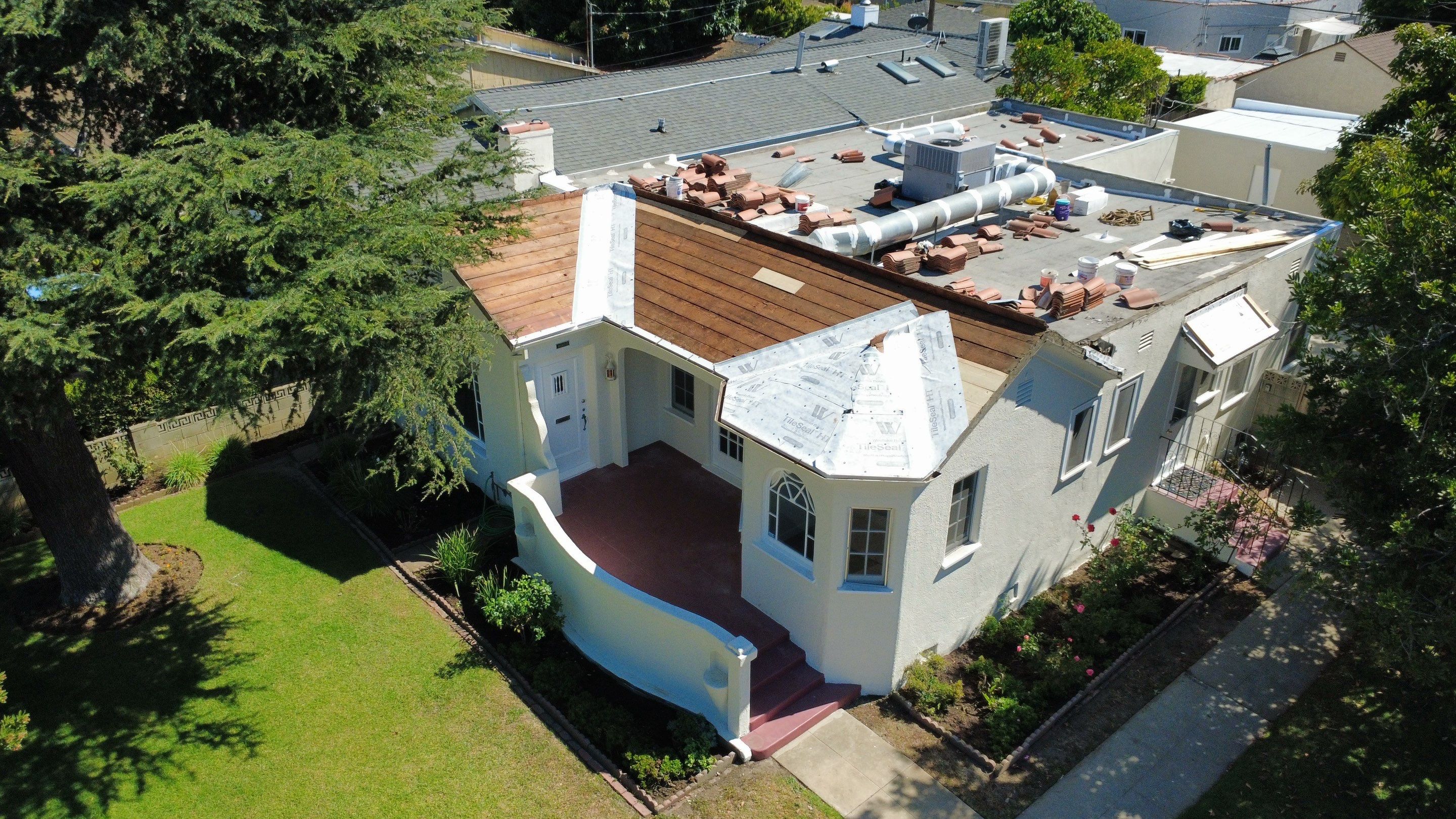 Tile Reset and Silicone Membrane Installation by Hull Brothers Roofing