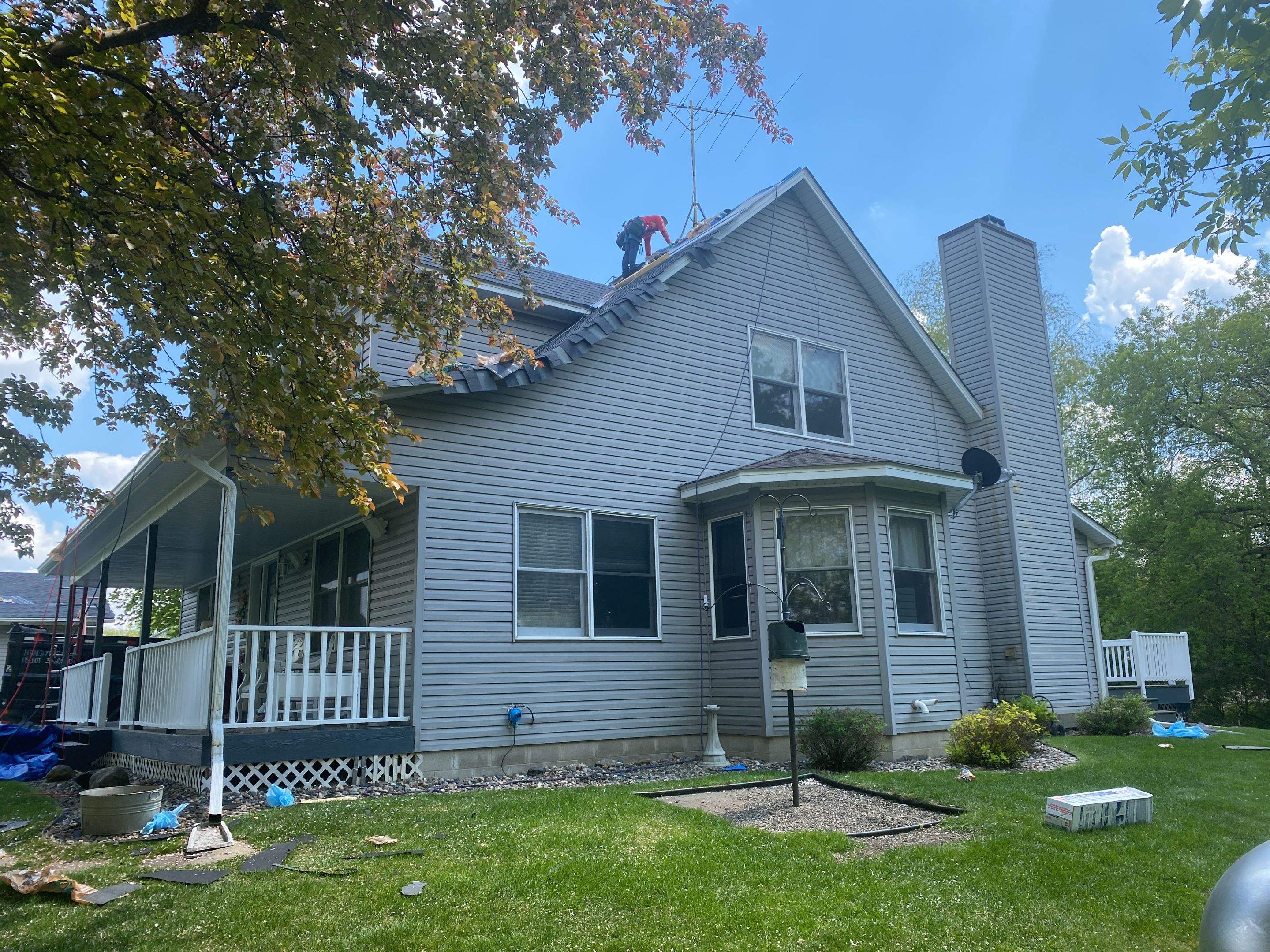 Residential Roofing Installation using Certainteed Landmark Moire Black by MODERN EXTERIOR SYSTEMS