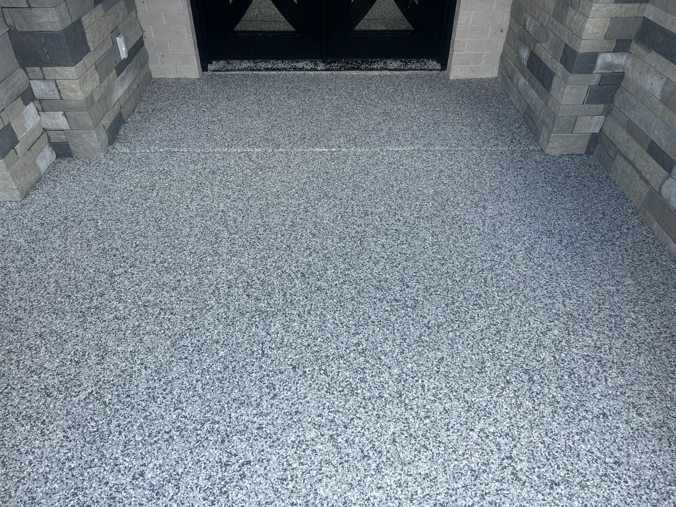 Porch & Garage Using Tidal Wave & Gravel  by Elite Floor Solutions