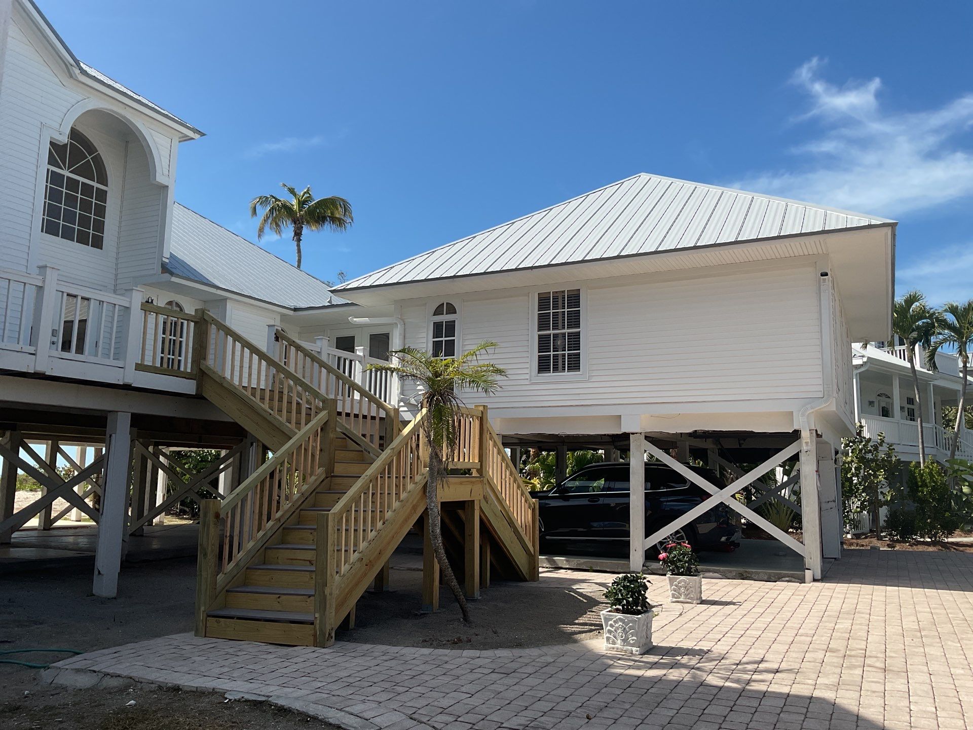 Downspout Installation using Downspout Extension in Sanibel FL by Gutter Professors