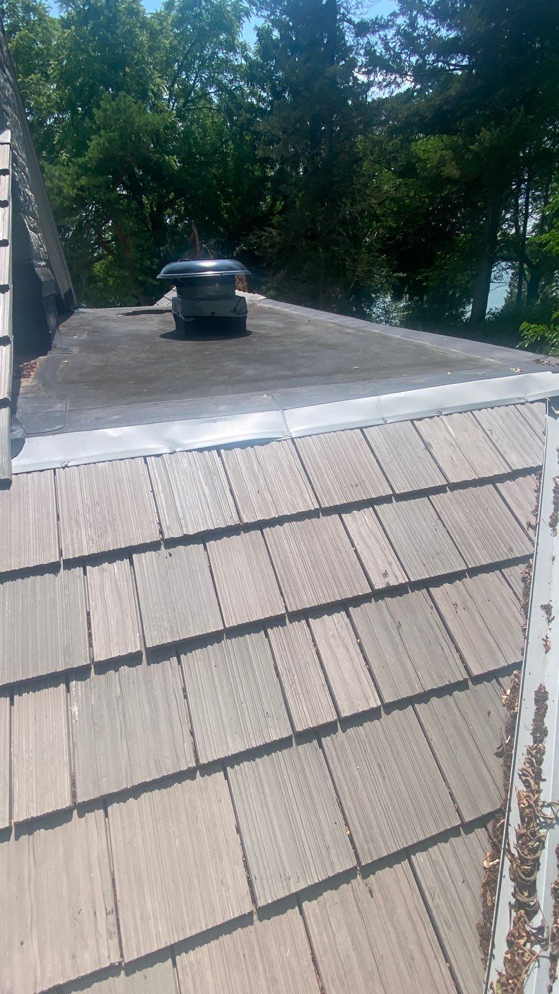 DaVinci Roof Installation with Snow Guards in Oconomowoc Lake by Custom Installations