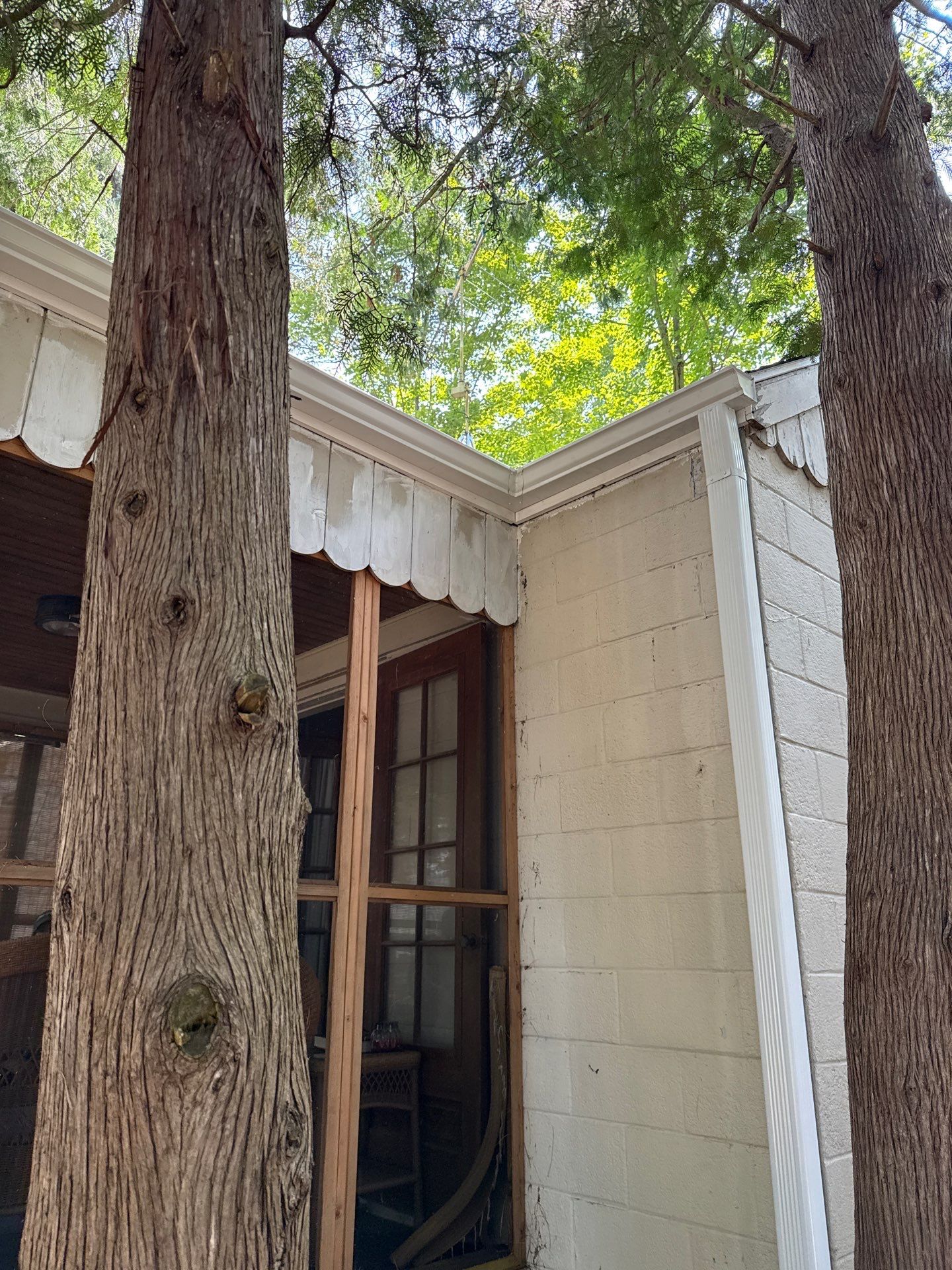 White Metal Gutter and Downspout Installation in Bellaire by Rainbow Seamless Systems