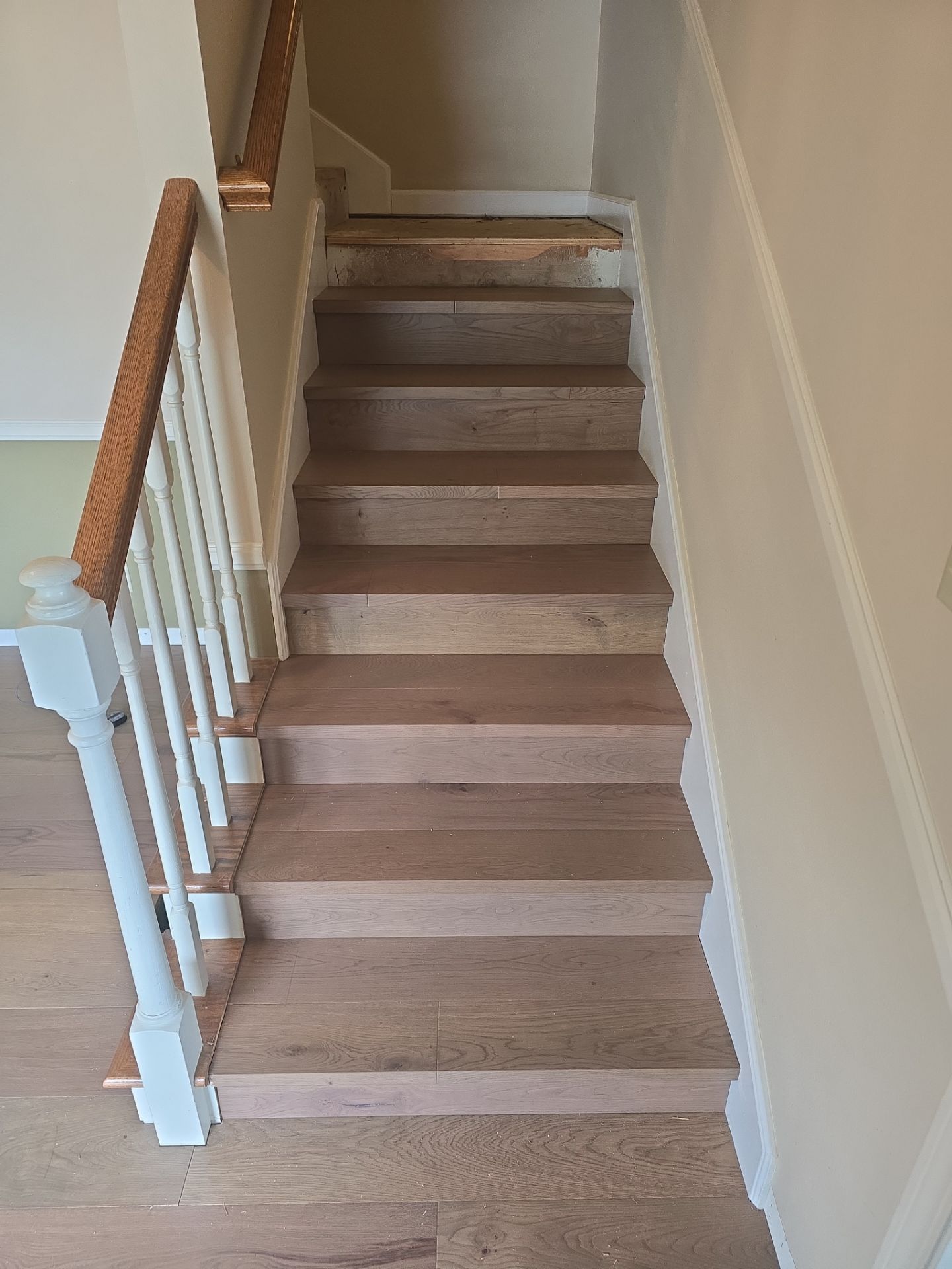 Engineered Wood Flooring Installation and Staircase Upgrade in Brookings by KMD Surfaces INC.