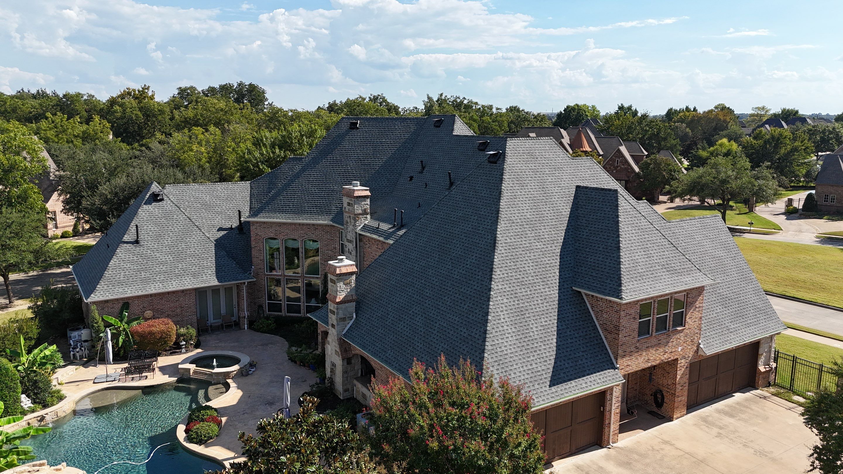 Southlake Texas Estate - Roof, Copper Awning and Gutter Project by First United Roofing & Construction