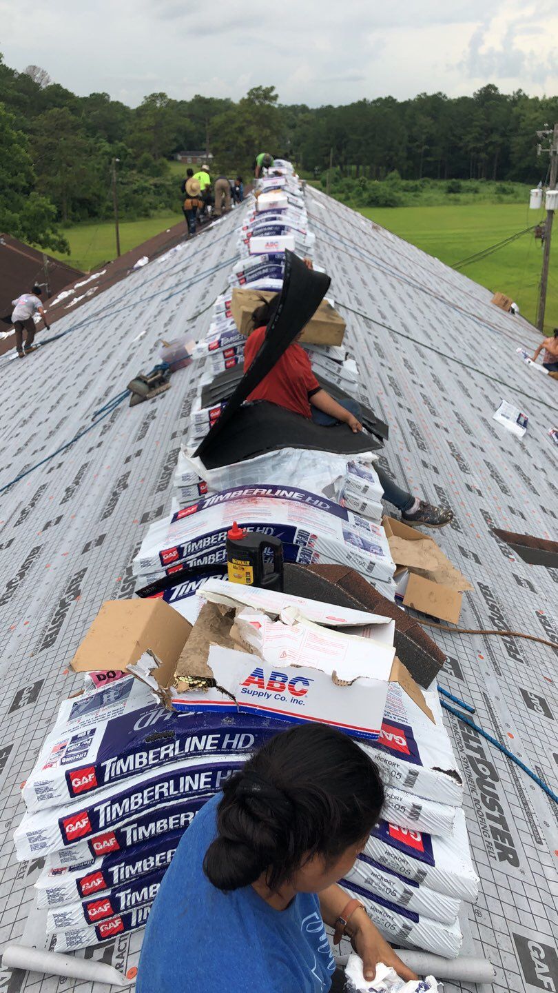 Residential Roofing Installation using Roof Replacement by American Roofing & Construction LLC
