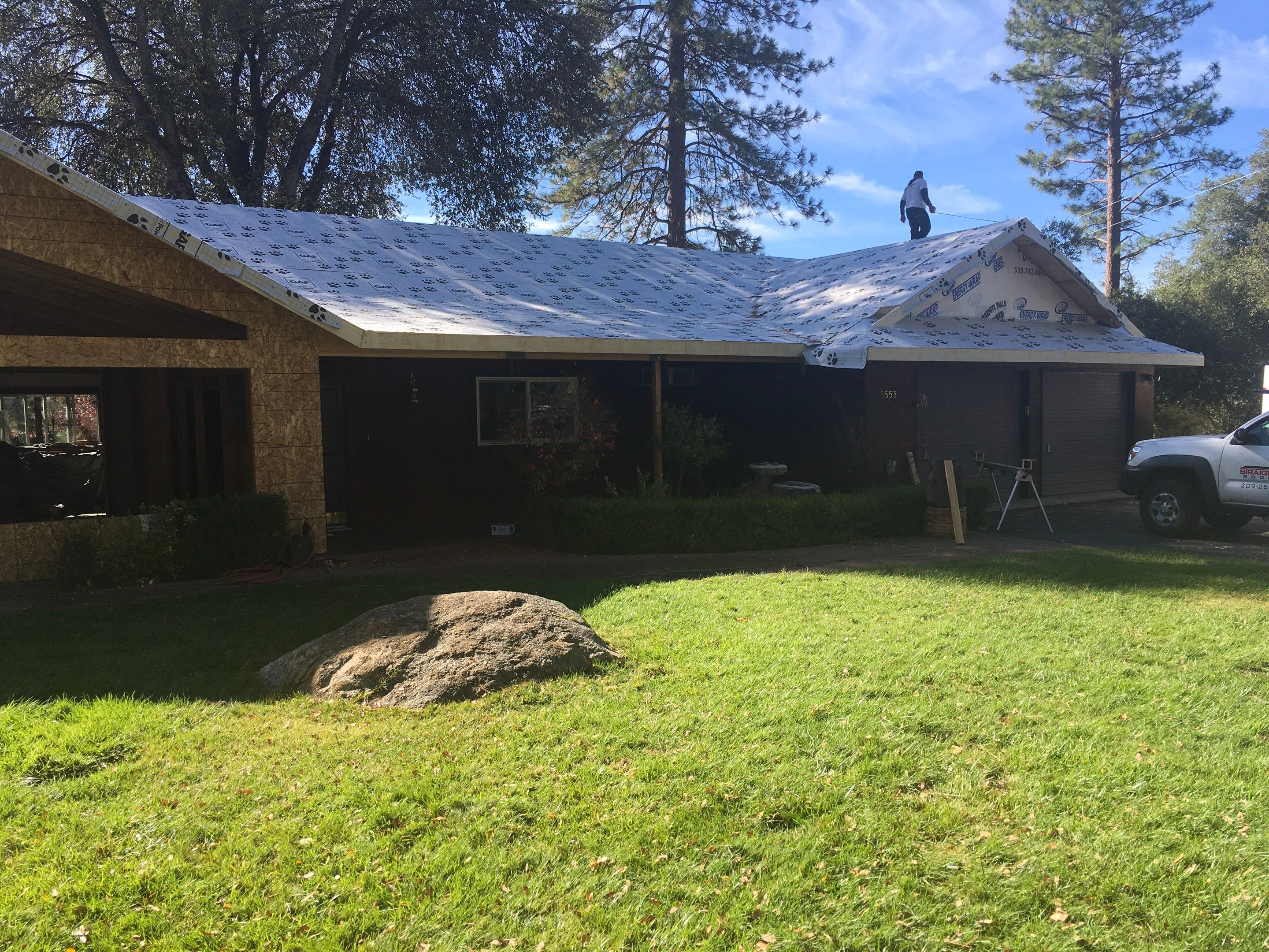 Metal roofing installation using Standing seam metal roofing system by Straight Edge Roofing Inc