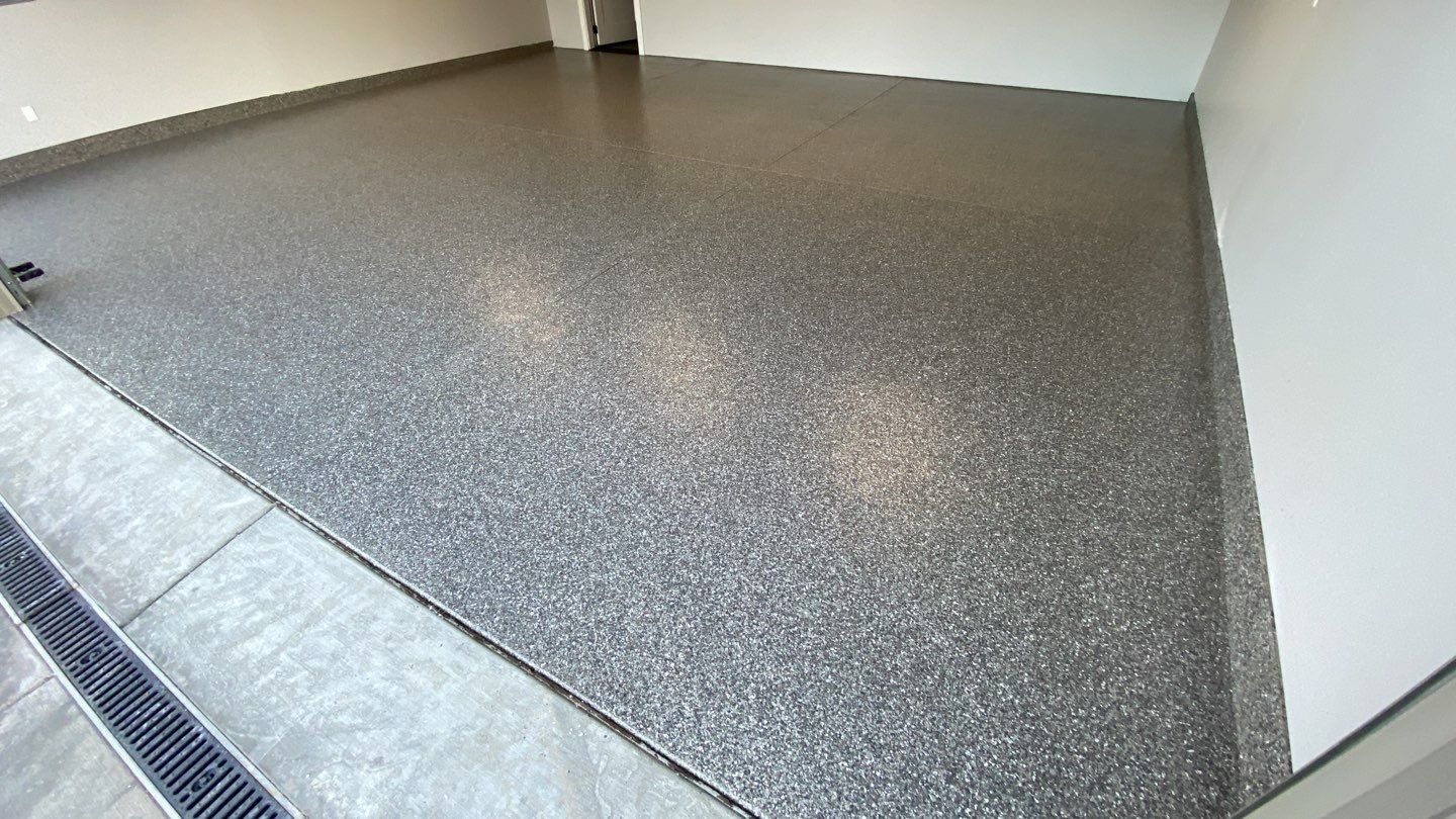 Garage Transformation using Domino by Croc Coatings, LLC